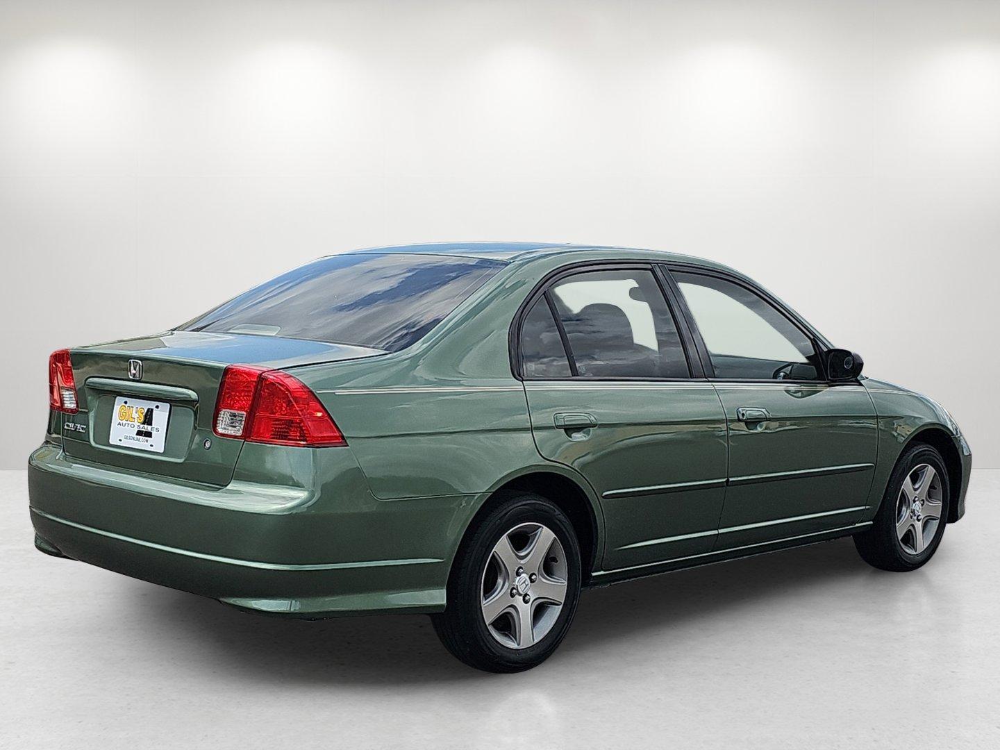 2004 /Ivory Honda Civic LX (2HGES16534H) with an Gas I4 1.7L/102 engine, 4-Speed Automatic transmission, located at 521 Old Farm Lane Rd, Prattville, AL, 36066, (334) 325-1505, 32.482460, -86.416367 - 2004 Honda Civic LX - Photo#5