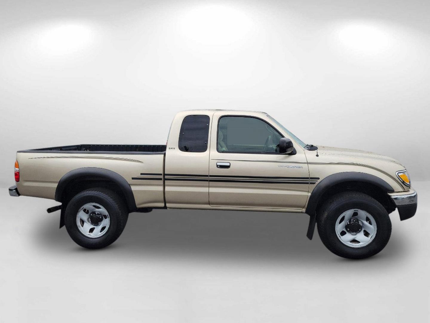 2004 Gold Toyota Tacoma PreRunner (5TESN92N34Z) with an Gas V6 3.4L/208 engine, 4-Speed Automatic w/OD transmission, located at 7000 Northlake Connector, Columbus, GA, 31904, (706) 987-8085, 32.524975, -84.978134 - 2004 Toyota Tacoma PreRunner - Photo#5