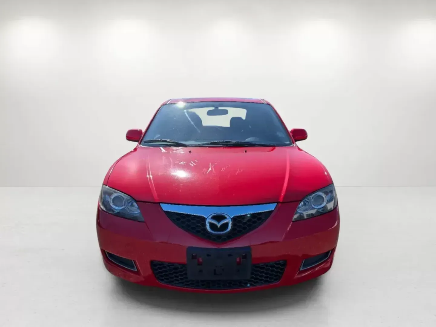 2007 /Black Mazda Mazda3 i Touring (JM1BK32G771) with an Gas I4 2.0L/122 engine, 4-Speed Automatic w/OD transmission, located at 7000 Northlake Connector, Columbus, GA, 31904, (706) 987-8085, 32.524975, -84.978134 - 2007 Mazda Mazda3 i Touring - Photo#2