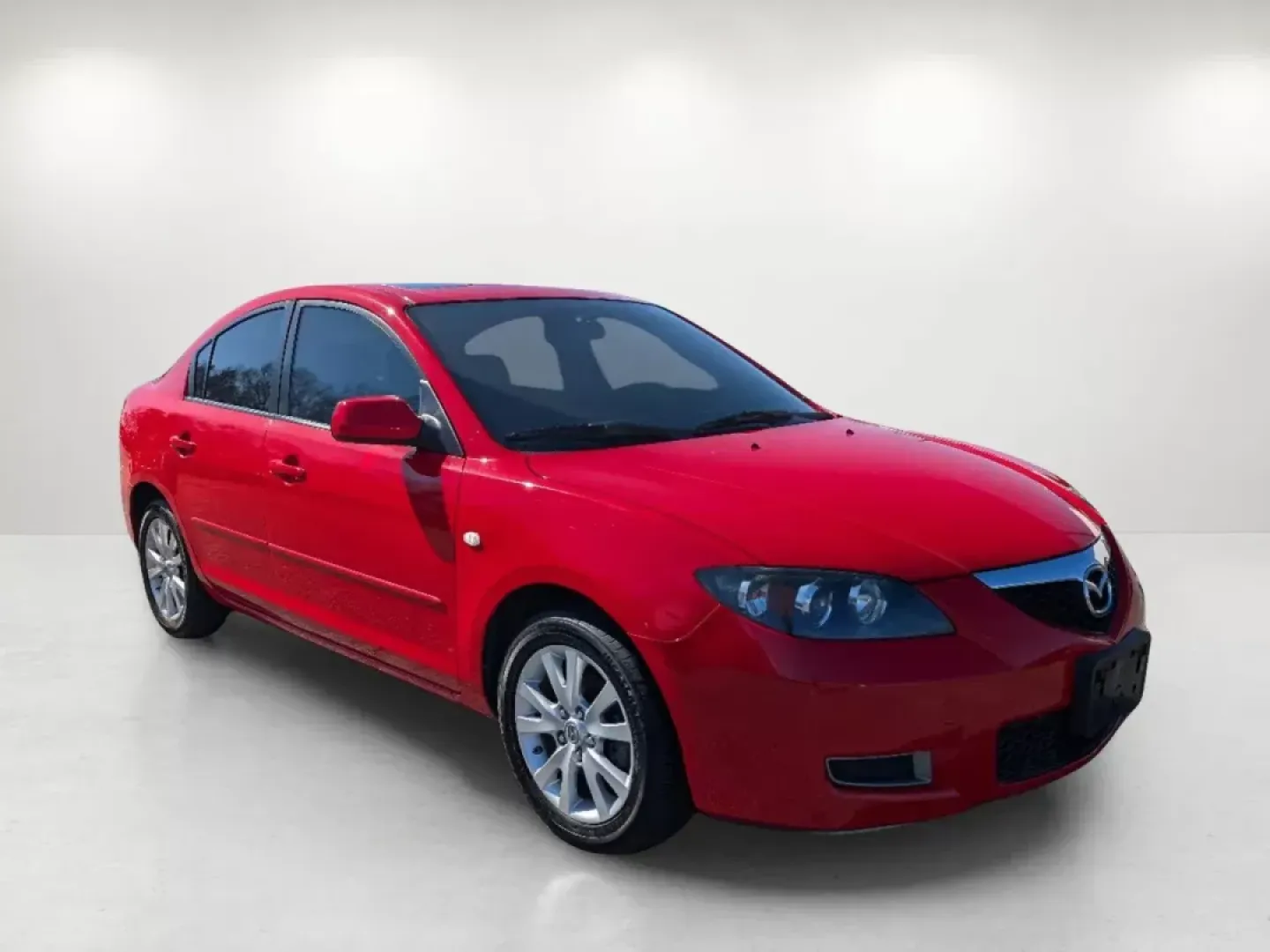 2007 /Black Mazda Mazda3 i Touring (JM1BK32G771) with an Gas I4 2.0L/122 engine, 4-Speed Automatic w/OD transmission, located at 7000 Northlake Connector, Columbus, GA, 31904, (706) 987-8085, 32.524975, -84.978134 - 2007 Mazda Mazda3 i Touring - Photo#3