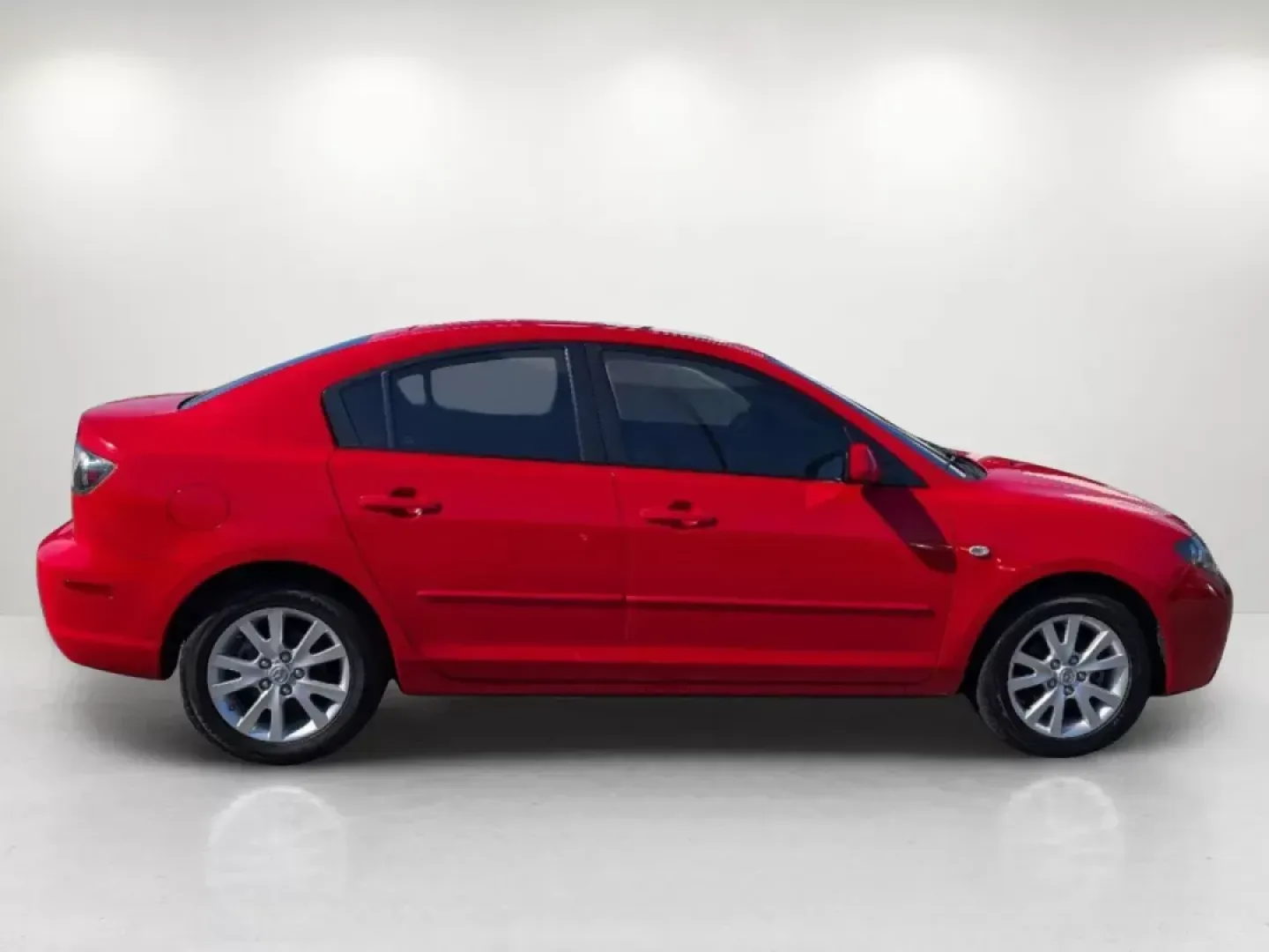 2007 /Black Mazda Mazda3 i Touring (JM1BK32G771) with an Gas I4 2.0L/122 engine, 4-Speed Automatic w/OD transmission, located at 7000 Northlake Connector, Columbus, GA, 31904, (706) 987-8085, 32.524975, -84.978134 - 2007 Mazda Mazda3 i Touring - Photo#4