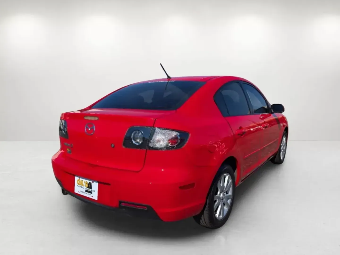 2007 /Black Mazda Mazda3 i Touring (JM1BK32G771) with an Gas I4 2.0L/122 engine, 4-Speed Automatic w/OD transmission, located at 7000 Northlake Connector, Columbus, GA, 31904, (706) 987-8085, 32.524975, -84.978134 - 2007 Mazda Mazda3 i Touring - Photo#5