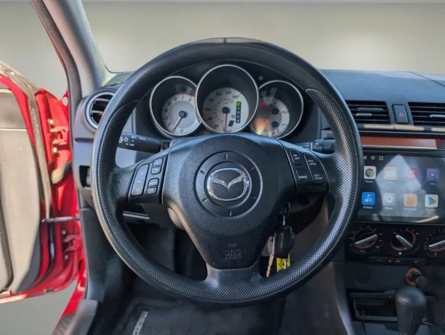 2007 /Black Mazda Mazda3 i Touring (JM1BK32G771) with an Gas I4 2.0L/122 engine, 4-Speed Automatic w/OD transmission, located at 7000 Northlake Connector, Columbus, GA, 31904, (706) 987-8085, 32.524975, -84.978134 - 2007 Mazda Mazda3 i Touring - Photo#16