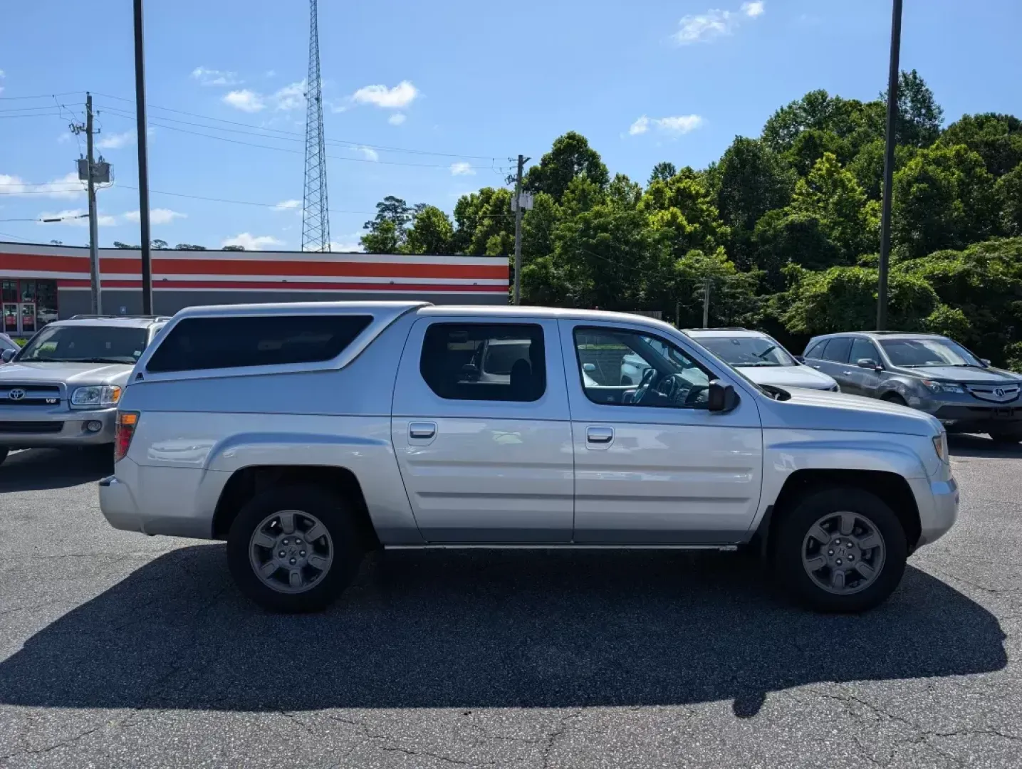 2008 Honda Ridgeline RTX (2HJYK16398H) with an Gas V6 3.5L/212 engine, 5-Speed Automatic w/OD transmission, located at 5115 14th Ave., Columbus, GA, 31904, (706) 323-0345, 32.511494, -84.971046 - **Elevate Your Adventures: 2008 Honda Ridgeline RTX at Gils Auto Columbus**<br /> <br /> Are you searching for the perfect blend of utility and comfort for your next adventure? Look no further than this 2008 Honda Ridgeline RTX, available at Gils Auto in Columbus, GA. Ideal for weekend getaways, th - Photo#3