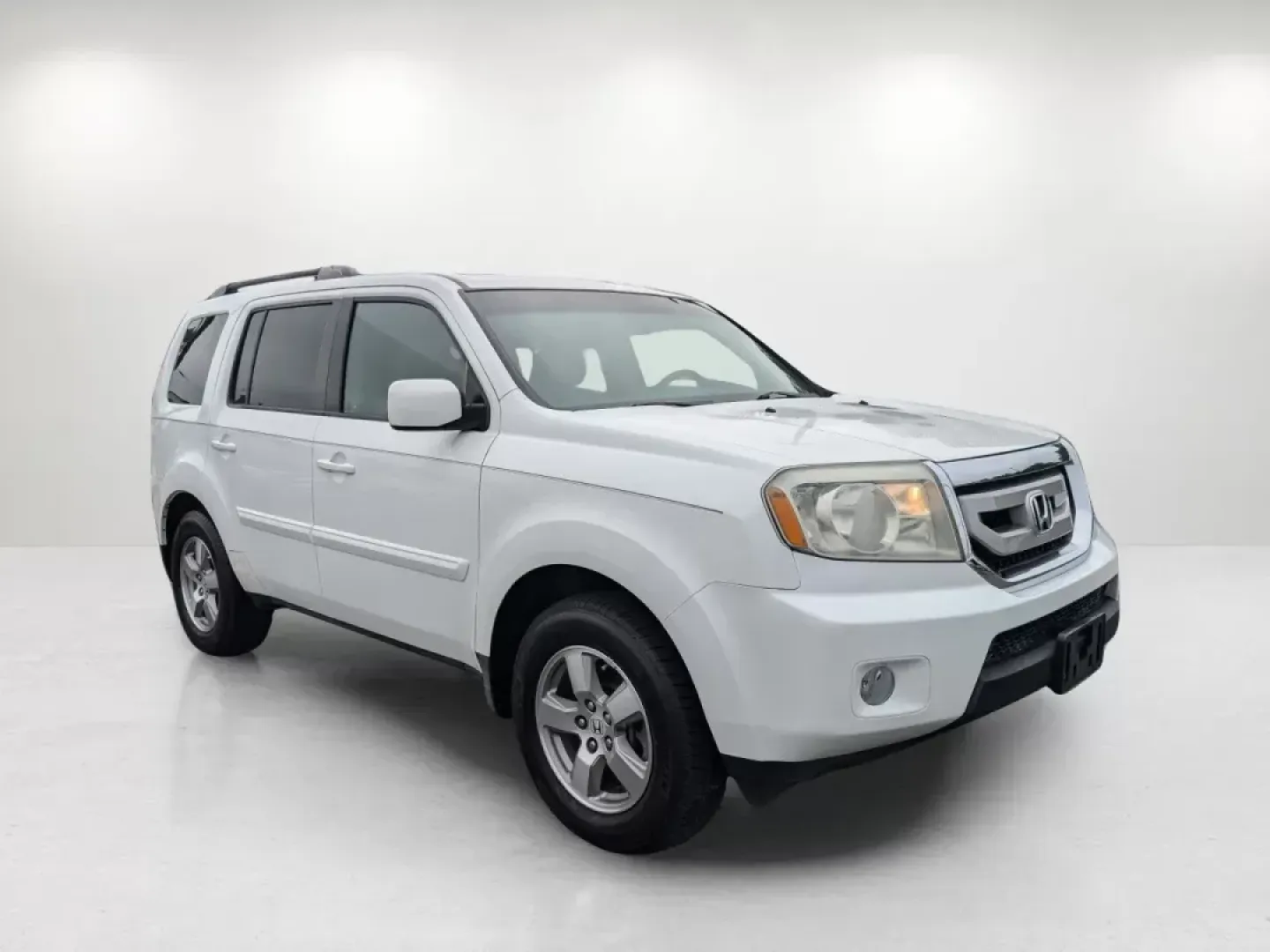 2009 Honda Pilot EX-L (5FNYF385X9B) with an Gas V6 3.5L/212 engine, 5-Speed Automatic w/OD transmission, located at 1430 Gateway Drive, Opelika, AL, 36801, (334) 239-0944, 32.637871, -85.409790 - **Adventure Awaits with the 2009 Honda Pilot EX-L at Gils Auto - Opelika!**<br /> <br /> Are you ready to elevate your family's adventures or make your daily commute more enjoyable? The 2009 Honda Pilot EX-L, available now at Gils Auto, is the perfect blend of reliability, space, and comfort, making - Photo#2