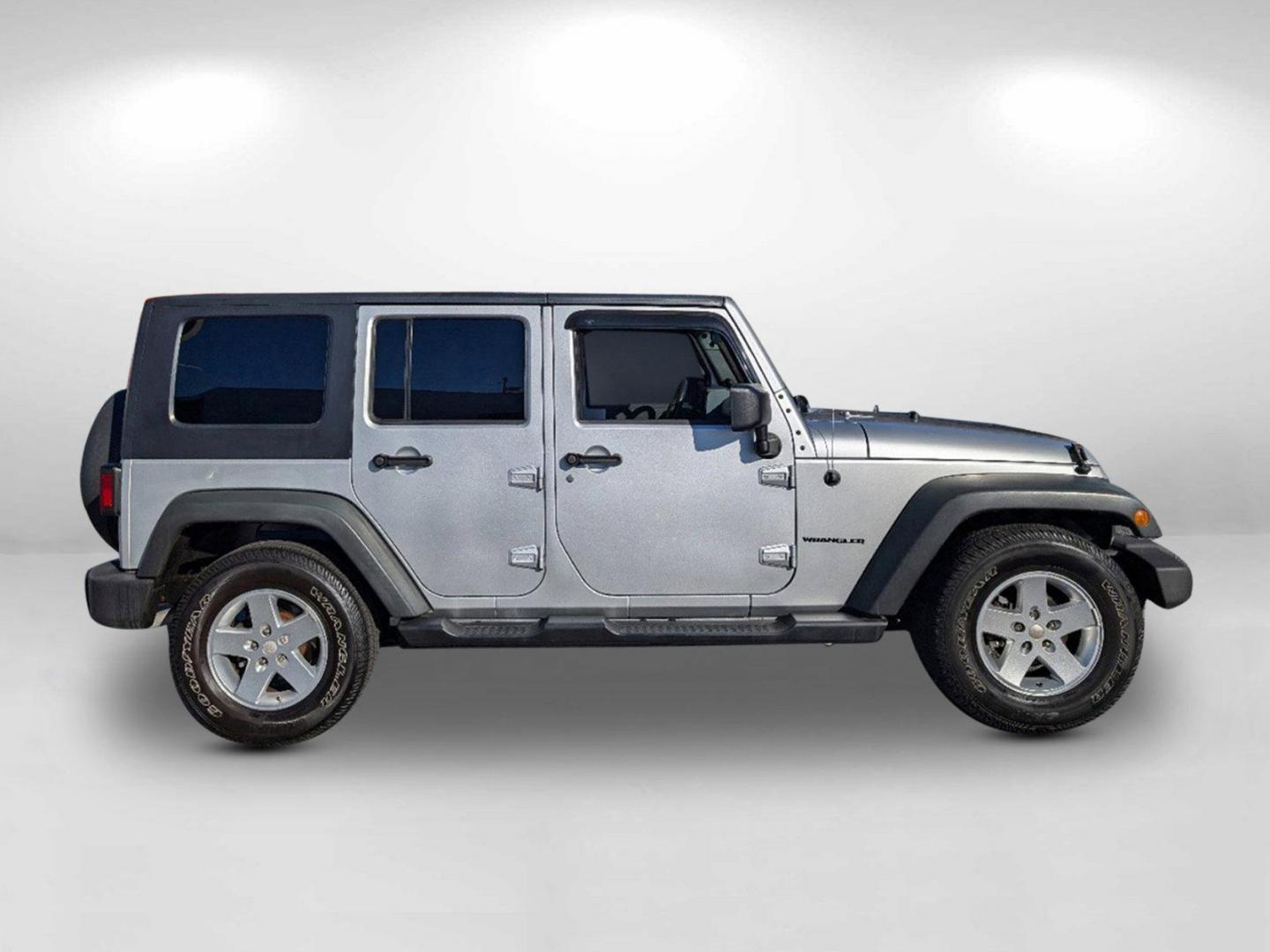 2010 /Dark Slate Gray/Medium Slate Gray Jeep Wrangler Unlimited Sport (1J4BB3H13AL) with an Gas V6 3.8L/231 engine, 4-Speed Automatic transmission, located at 1430 Gateway Drive, Opelika, AL, 36801, (334) 239-0944, 32.637871, -85.409790 - 2010 Jeep Wrangler Unlimited Sport - Photo#5