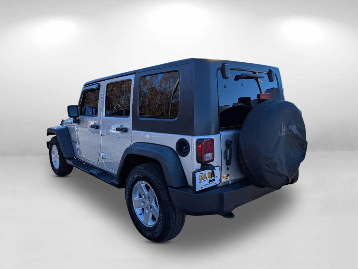 2010 /Dark Slate Gray/Medium Slate Gray Jeep Wrangler Unlimited Sport (1J4BB3H13AL) with an Gas V6 3.8L/231 engine, 4-Speed Automatic transmission, located at 1430 Gateway Drive, Opelika, AL, 36801, (334) 239-0944, 32.637871, -85.409790 - 2010 Jeep Wrangler Unlimited Sport - Photo#8