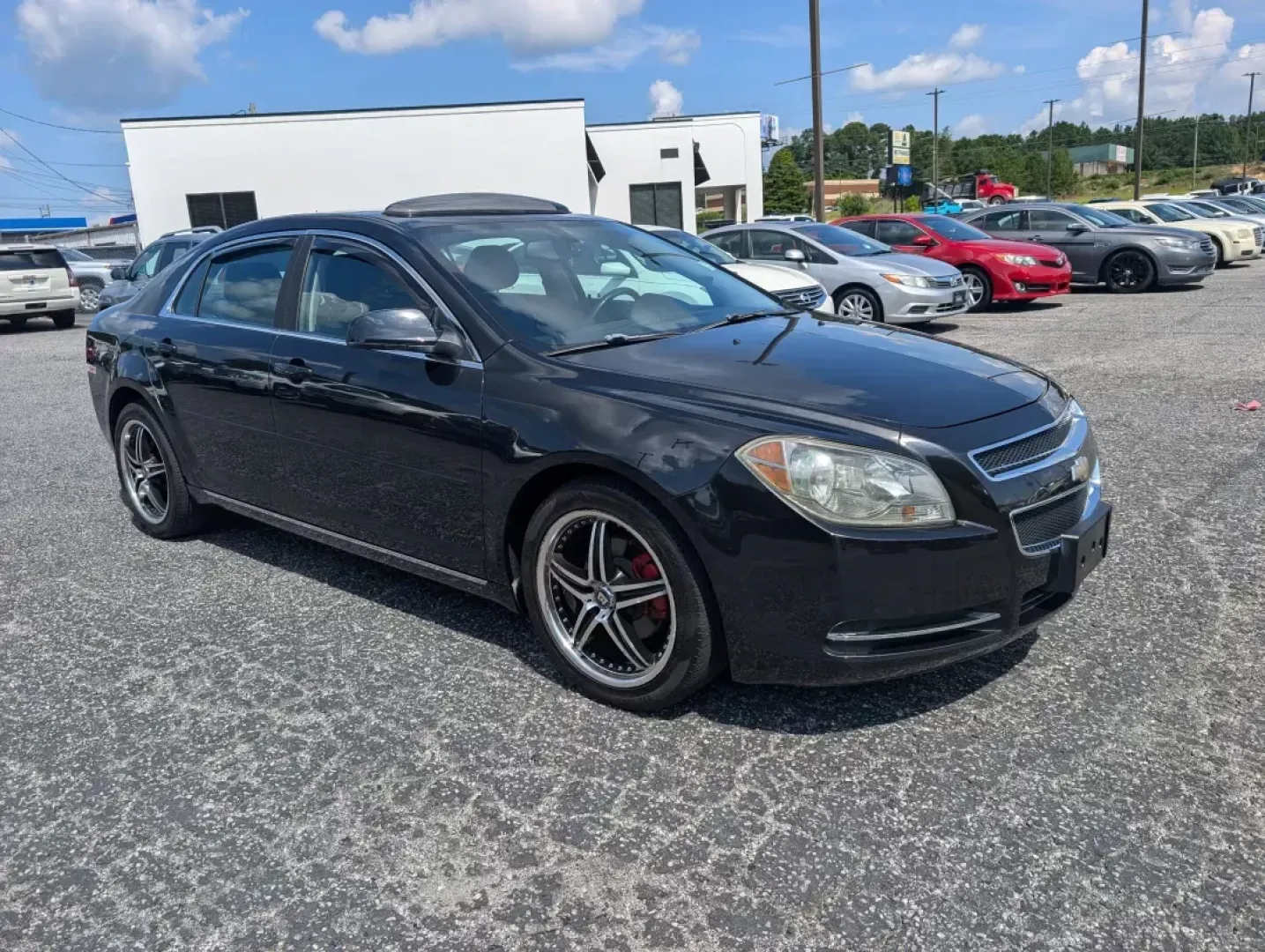 2011 /Ebony Chevrolet Malibu LT w/2LT (1G1ZD5E79BF) with an Other engine, located at 3959 U.S. 80 W, Phenix City, AL, 36870, (334) 297-4885, 32.469296, -85.135185 - **Discover the Perfect Blend of Style and Functionality with This 2011 Chevrolet Malibu LT at Gils Auto - Phenix City!**<br /> <br /> Are you searching for a reliable sedan that will suit your busy lifestyle? Look no further than this stunning 2011 Chevrolet Malibu LT w/2LT, available now at Gils Au - Photo#2