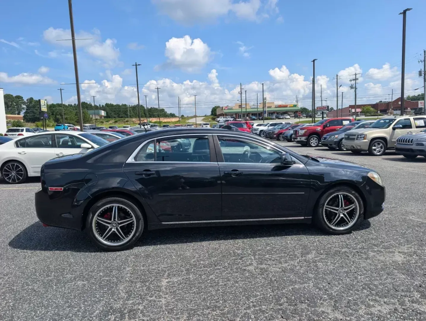 2011 /Ebony Chevrolet Malibu LT w/2LT (1G1ZD5E79BF) with an Other engine, located at 3959 U.S. 80 W, Phenix City, AL, 36870, (334) 297-4885, 32.469296, -85.135185 - **Discover the Perfect Blend of Style and Functionality with This 2011 Chevrolet Malibu LT at Gils Auto - Phenix City!**<br /> <br /> Are you searching for a reliable sedan that will suit your busy lifestyle? Look no further than this stunning 2011 Chevrolet Malibu LT w/2LT, available now at Gils Au - Photo#3