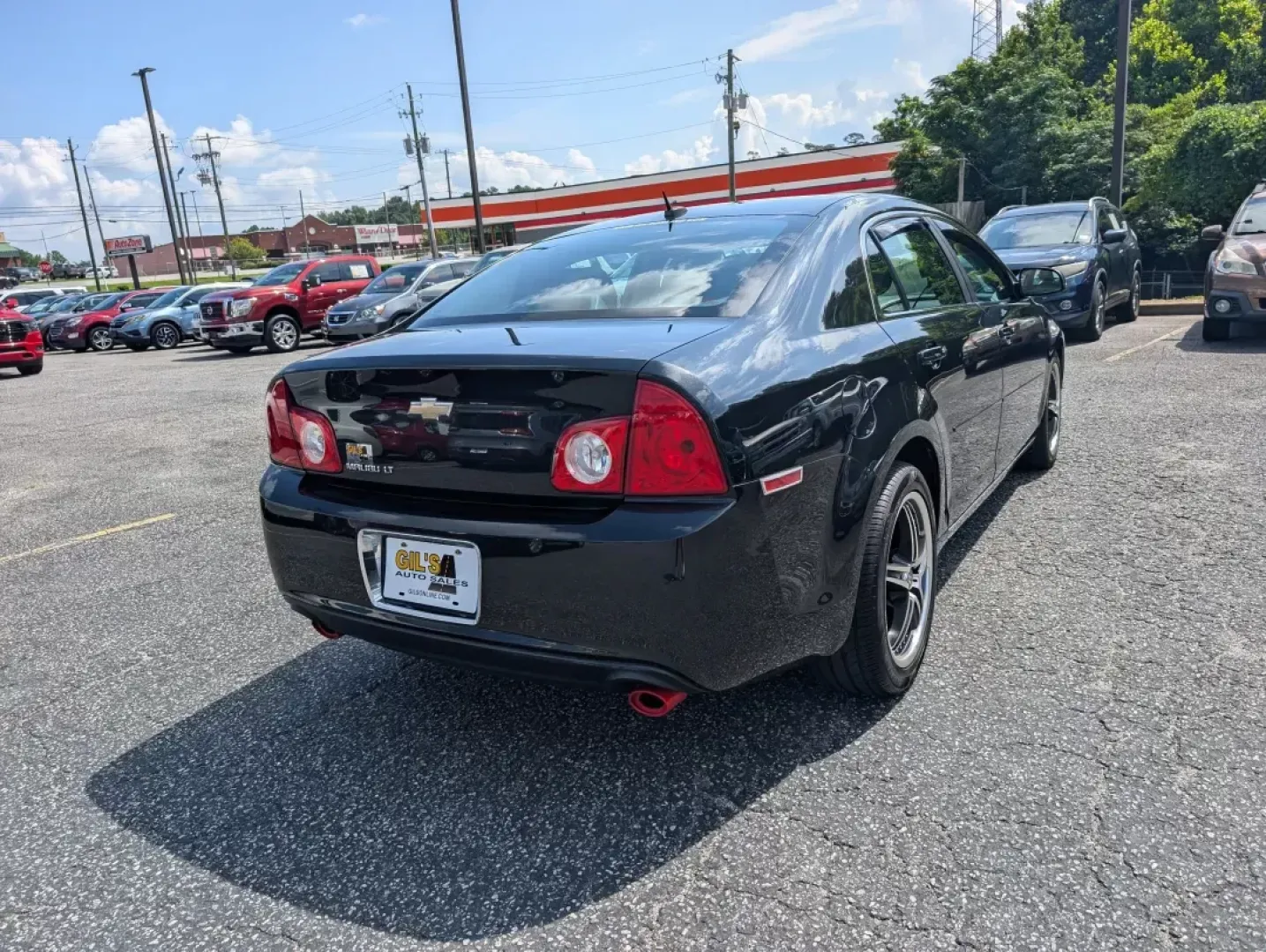 2011 /Ebony Chevrolet Malibu LT w/2LT (1G1ZD5E79BF) with an Other engine, located at 3959 U.S. 80 W, Phenix City, AL, 36870, (334) 297-4885, 32.469296, -85.135185 - **Discover the Perfect Blend of Style and Functionality with This 2011 Chevrolet Malibu LT at Gils Auto - Phenix City!**<br /> <br /> Are you searching for a reliable sedan that will suit your busy lifestyle? Look no further than this stunning 2011 Chevrolet Malibu LT w/2LT, available now at Gils Au - Photo#4