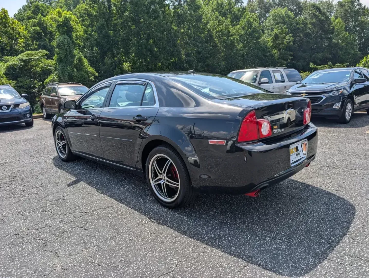 2011 /Ebony Chevrolet Malibu LT w/2LT (1G1ZD5E79BF) with an Other engine, located at 3959 U.S. 80 W, Phenix City, AL, 36870, (334) 297-4885, 32.469296, -85.135185 - **Discover the Perfect Blend of Style and Functionality with This 2011 Chevrolet Malibu LT at Gils Auto - Phenix City!**<br /> <br /> Are you searching for a reliable sedan that will suit your busy lifestyle? Look no further than this stunning 2011 Chevrolet Malibu LT w/2LT, available now at Gils Au - Photo#6