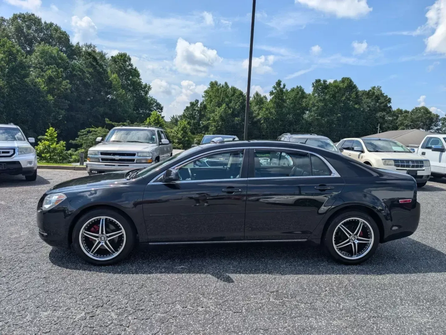 2011 /Ebony Chevrolet Malibu LT w/2LT (1G1ZD5E79BF) with an Other engine, located at 3959 U.S. 80 W, Phenix City, AL, 36870, (334) 297-4885, 32.469296, -85.135185 - **Discover the Perfect Blend of Style and Functionality with This 2011 Chevrolet Malibu LT at Gils Auto - Phenix City!**<br /> <br /> Are you searching for a reliable sedan that will suit your busy lifestyle? Look no further than this stunning 2011 Chevrolet Malibu LT w/2LT, available now at Gils Au - Photo#7