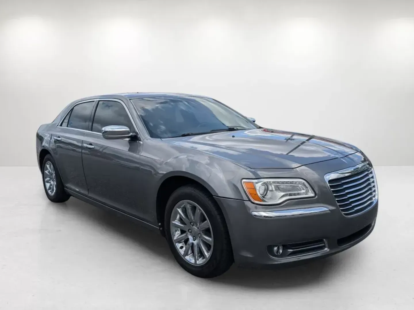 2011 /Black Interior Chrysler 300 Limited (2C3CA5CG7BH) with an Gas/Ethanol V6 3.6L/220 engine, 5-Speed Automatic w/Manual Shift transmission, located at 7000 Northlake Connector, Columbus, GA, 31904, (706) 987-8085, 32.524975, -84.978134 - **Drive in Style and Comfort with this 2011 Chrysler 300 Limited at Gils Auto Columbus #2!**<br /> <br /> Are you searching for a vehicle that perfectly balances luxury, performance, and practicality? Look no further! The 2011 Chrysler 300 Limited is ideal for those who crave a comfortable ride, ma - Photo#2