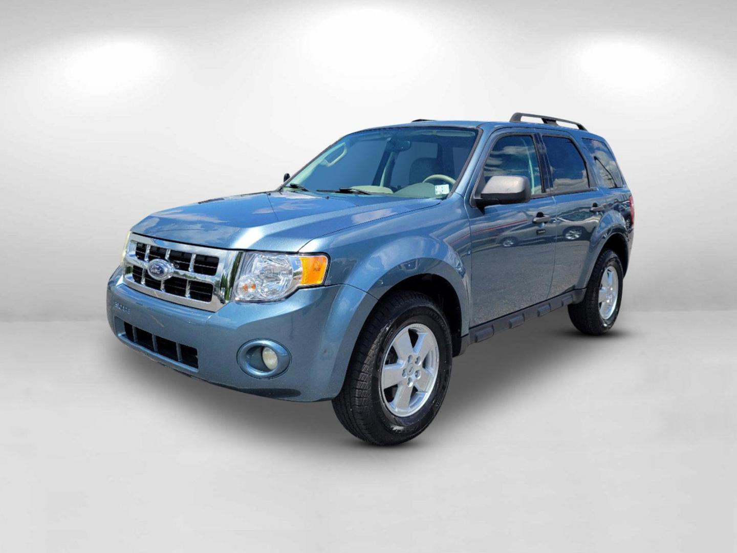 2011 Blue Ford Escape XLT (1FMCU0D73BK) with an Gas I4 2.5L/152 engine, 6-Speed Automatic transmission, located at 804 22nd Ave, Phenix City, AL, 36870, (334) 297-1860, 32.484749, -85.024475 - 2011 Ford Escape XLT - Photo#1