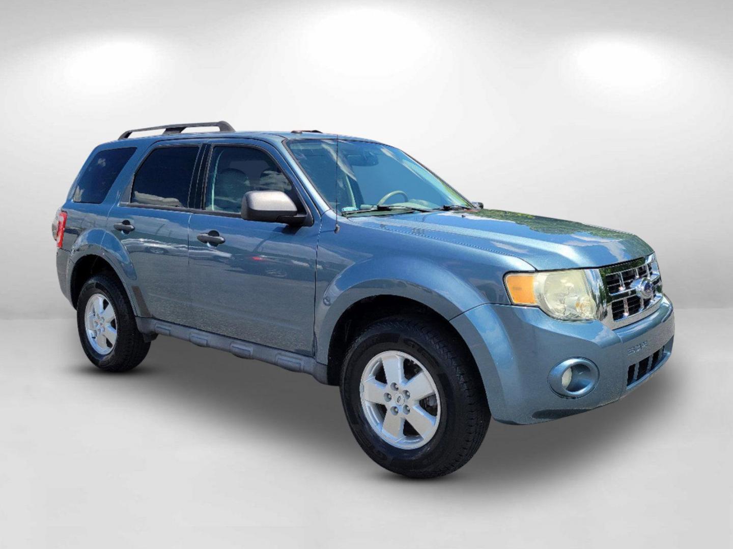 2011 Blue Ford Escape XLT (1FMCU0D73BK) with an Gas I4 2.5L/152 engine, 6-Speed Automatic transmission, located at 804 22nd Ave, Phenix City, AL, 36870, (334) 297-1860, 32.484749, -85.024475 - 2011 Ford Escape XLT - Photo#3