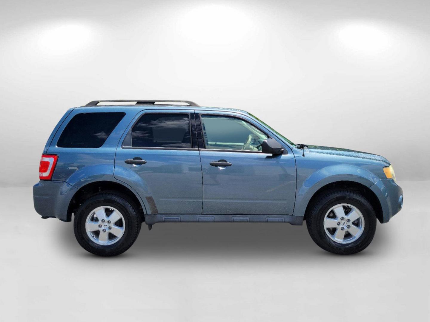 2011 Blue Ford Escape XLT (1FMCU0D73BK) with an Gas I4 2.5L/152 engine, 6-Speed Automatic transmission, located at 804 22nd Ave, Phenix City, AL, 36870, (334) 297-1860, 32.484749, -85.024475 - 2011 Ford Escape XLT - Photo#4