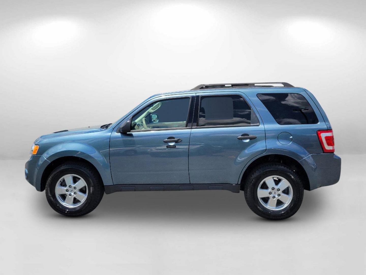 2011 Blue Ford Escape XLT (1FMCU0D73BK) with an Gas I4 2.5L/152 engine, 6-Speed Automatic transmission, located at 804 22nd Ave, Phenix City, AL, 36870, (334) 297-1860, 32.484749, -85.024475 - 2011 Ford Escape XLT - Photo#8