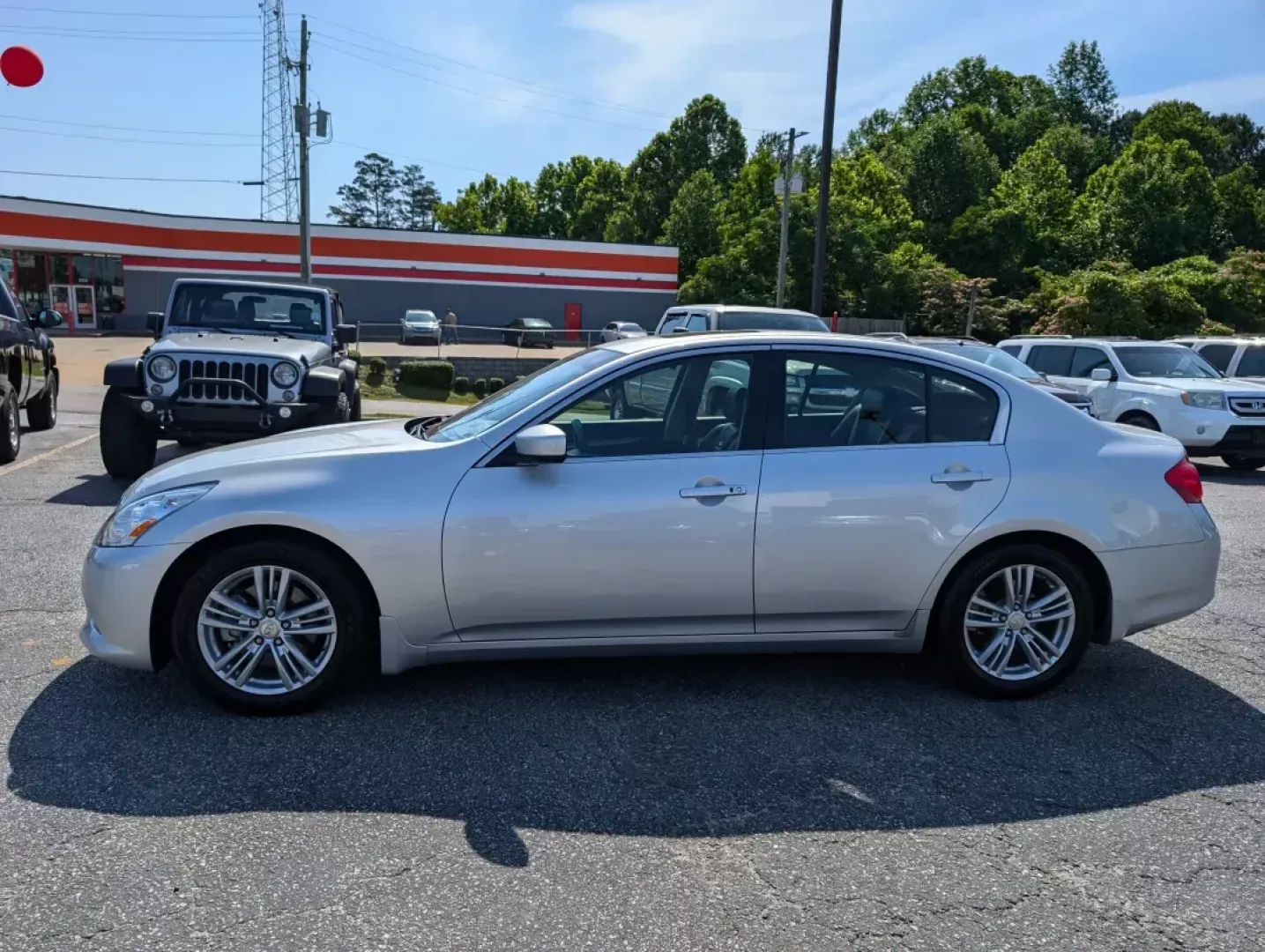 2011 /Graphite Infiniti G37 Sedan Journey (JN1CV6AP3BM) with an Gas V6 3.7L/225 engine, 7-Speed Automatic w/OD transmission, located at 804 22nd Ave, Phenix City, AL, 36870, (334) 297-1860, 32.484749, -85.024475 - Elevate your daily drive with the stunning 2011 Infiniti G37 Sedan, now available at Gils Auto - Phenix City #2! This sophisticated sedan is not just a mode of transportation; it's a lifestyle upgrade, perfectly suited for professionals, growing families, or anyone seeking a blend of luxury and perf - Photo#7