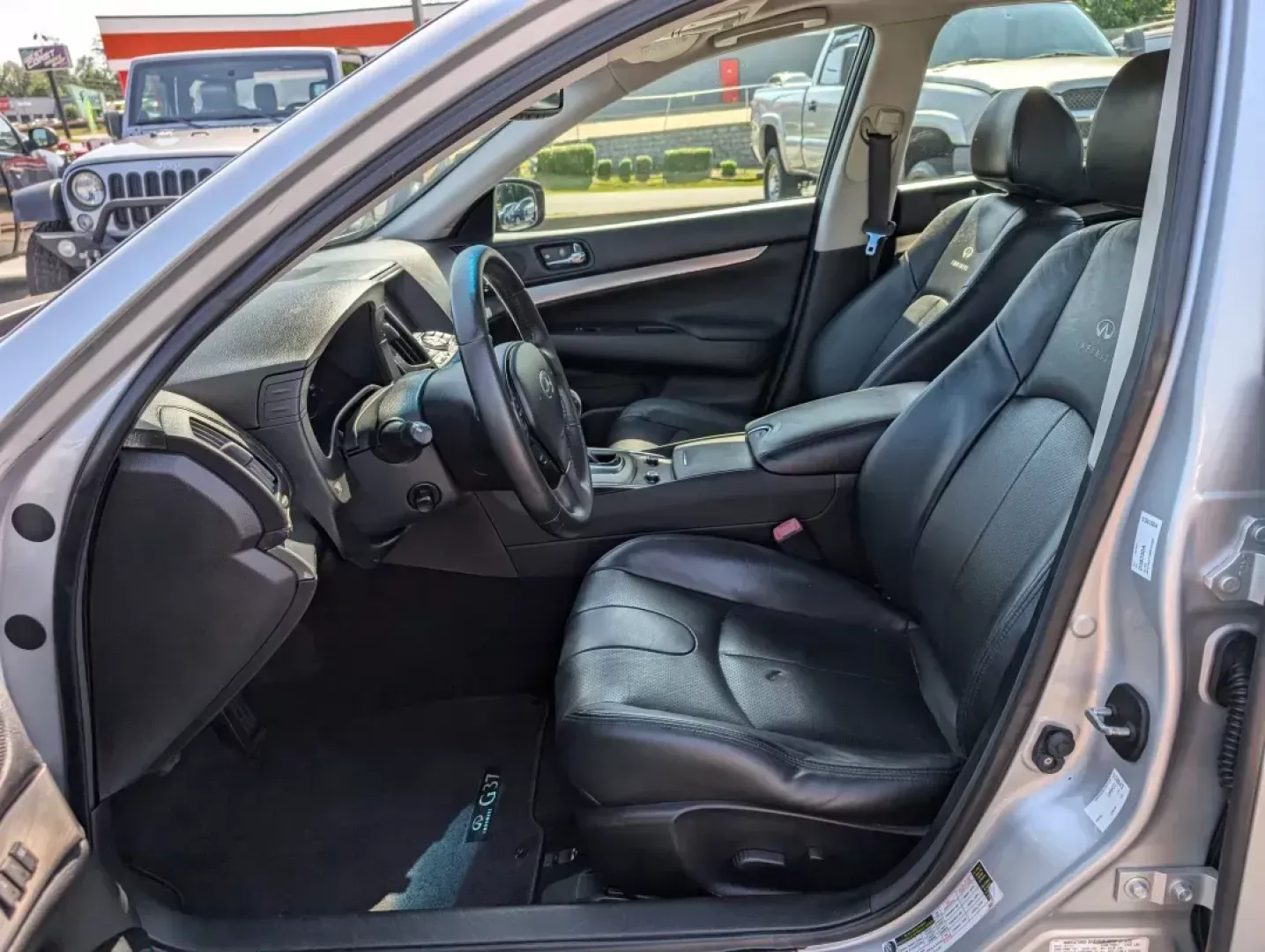 2011 /Graphite Infiniti G37 Sedan Journey (JN1CV6AP3BM) with an Gas V6 3.7L/225 engine, 7-Speed Automatic w/OD transmission, located at 804 22nd Ave, Phenix City, AL, 36870, (334) 297-1860, 32.484749, -85.024475 - Elevate your daily drive with the stunning 2011 Infiniti G37 Sedan, now available at Gils Auto - Phenix City #2! This sophisticated sedan is not just a mode of transportation; it's a lifestyle upgrade, perfectly suited for professionals, growing families, or anyone seeking a blend of luxury and perf - Photo#9
