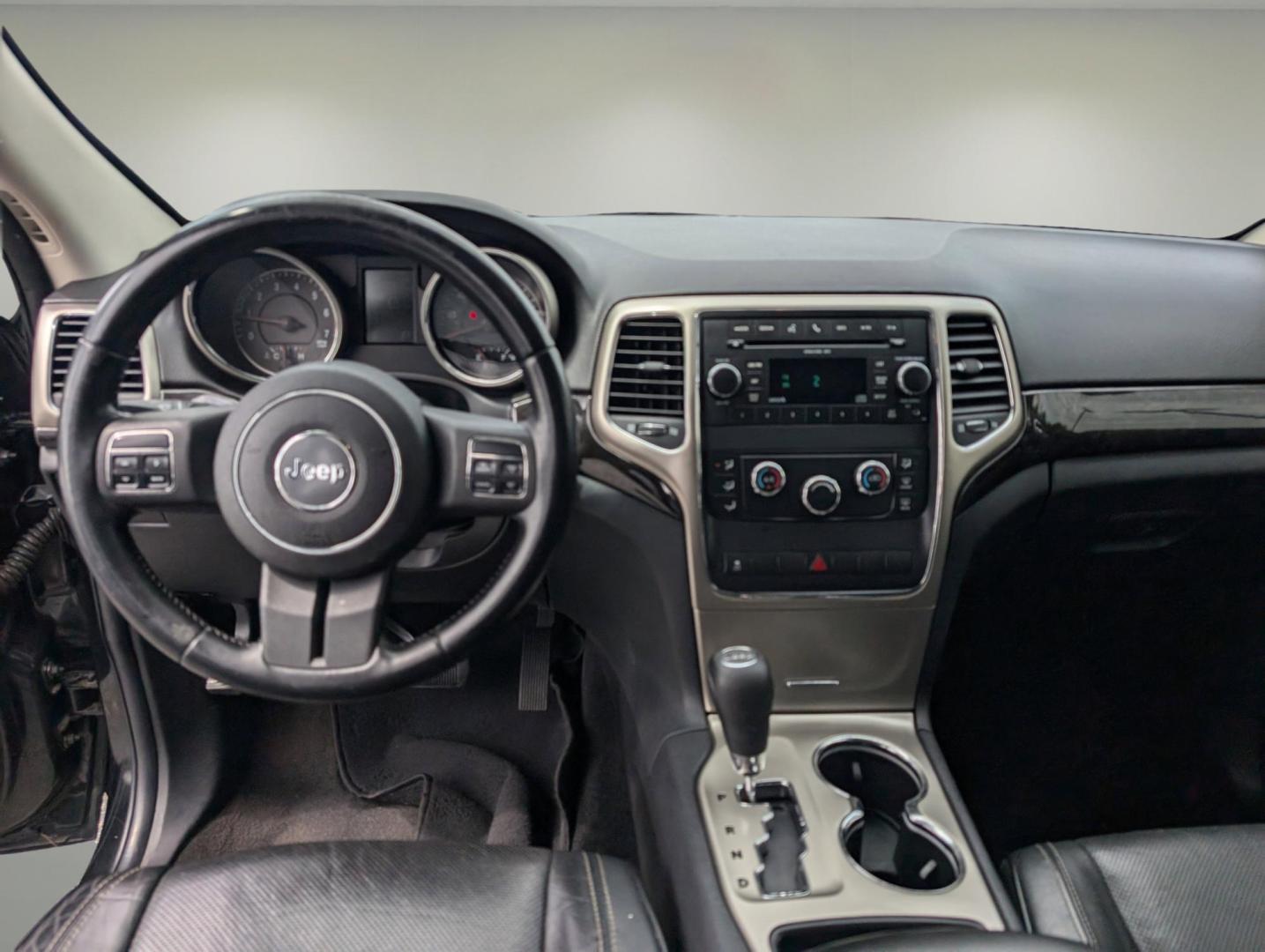 2011 /Black Interior Jeep Grand Cherokee Laredo (1J4RS4GG8BC) with an Gas/Ethanol V6 3.6L/220 engine, 5-Speed Automatic transmission, located at 3959 U.S. 80 W, Phenix City, AL, 36870, (334) 297-4885, 32.469296, -85.135185 - 2011 Jeep Grand Cherokee Laredo - Photo#12