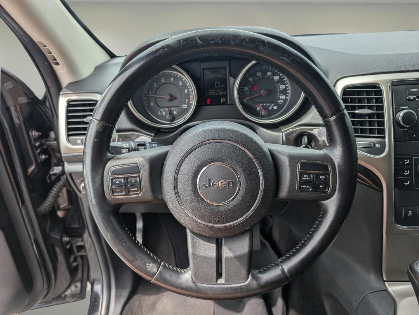 2011 /Black Interior Jeep Grand Cherokee Laredo (1J4RS4GG8BC) with an Gas/Ethanol V6 3.6L/220 engine, 5-Speed Automatic transmission, located at 3959 U.S. 80 W, Phenix City, AL, 36870, (334) 297-4885, 32.469296, -85.135185 - 2011 Jeep Grand Cherokee Laredo - Photo#15