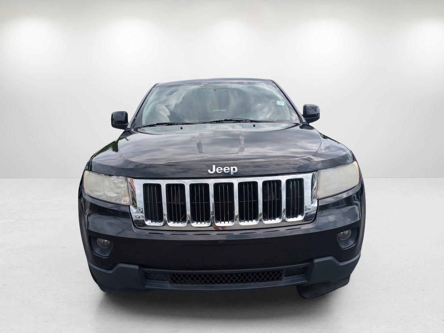 2011 /Black Interior Jeep Grand Cherokee Laredo (1J4RS4GG8BC) with an Gas/Ethanol V6 3.6L/220 engine, 5-Speed Automatic transmission, located at 3959 U.S. 80 W, Phenix City, AL, 36870, (334) 297-4885, 32.469296, -85.135185 - 2011 Jeep Grand Cherokee Laredo - Photo#1