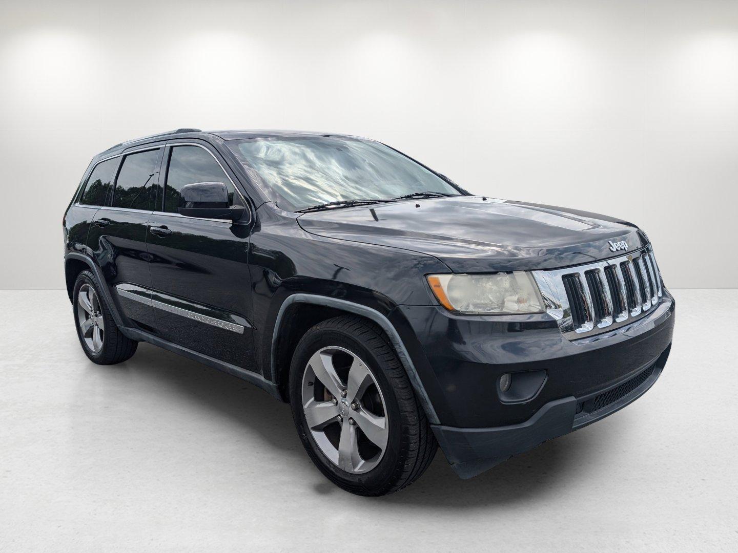 2011 /Black Interior Jeep Grand Cherokee Laredo (1J4RS4GG8BC) with an Gas/Ethanol V6 3.6L/220 engine, 5-Speed Automatic transmission, located at 3959 U.S. 80 W, Phenix City, AL, 36870, (334) 297-4885, 32.469296, -85.135185 - 2011 Jeep Grand Cherokee Laredo - Photo#2