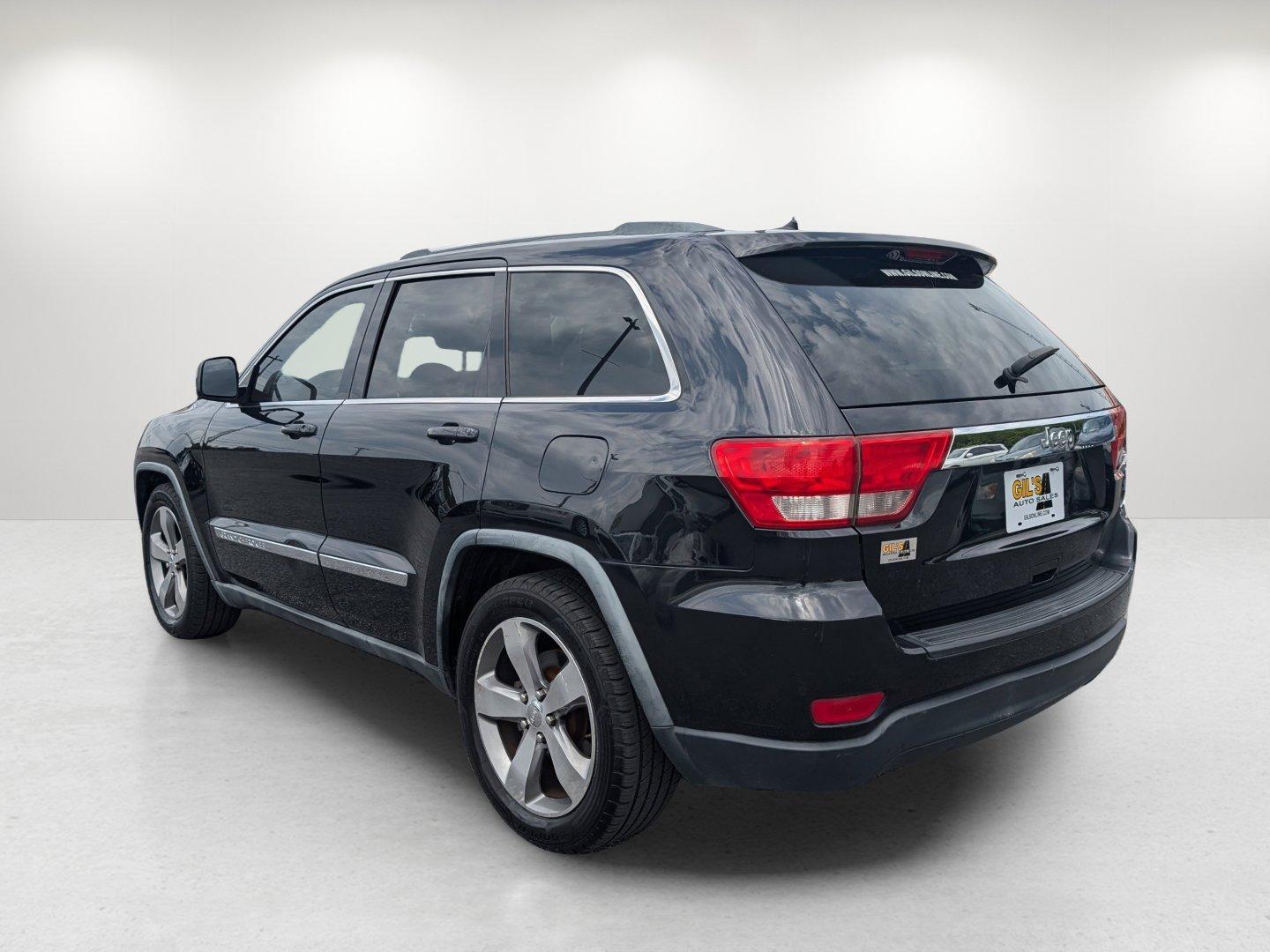 2011 /Black Interior Jeep Grand Cherokee Laredo (1J4RS4GG8BC) with an Gas/Ethanol V6 3.6L/220 engine, 5-Speed Automatic transmission, located at 3959 U.S. 80 W, Phenix City, AL, 36870, (334) 297-4885, 32.469296, -85.135185 - 2011 Jeep Grand Cherokee Laredo - Photo#6