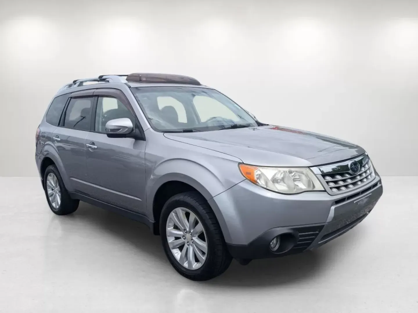 2011 /Platinum Subaru Forester 2.5X Touring (JF2SHAGC8BH) with an Other engine, located at 7000 Northlake Connector, Columbus, GA, 31904, (706) 987-8085, 32.524975, -84.978134 - **Explore Adventure with the 2011 Subaru Forester at Gils Auto!**<br /> <br /> Are you ready to elevate your lifestyle and take every road trip to the next level? The 2011 Subaru Forester, available now at Gils Auto in Phenix City, AL, is the ideal SUV for families, commuters, and adventurous spirit - Photo#2