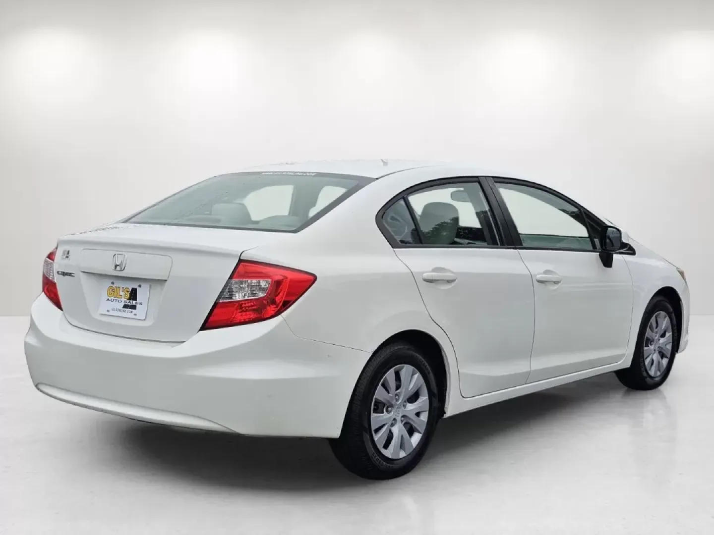 2012 Honda Civic Sdn LX (2HGFB2F5XCH) with an Other engine, located at 7000 Northlake Connector, Columbus, GA, 31904, (706) 987-8085, 32.524975, -84.978134 - Discover your next adventure in the sleek and efficient 2012 Honda Civic Sdn LX, available now at Gils Auto in Phenix City, AL. This remarkable sedan is not just a vehicle; it's a lifestyle choice, perfect for individuals and families looking for reliability, comfort, and style. Whether you're navig - Photo#4