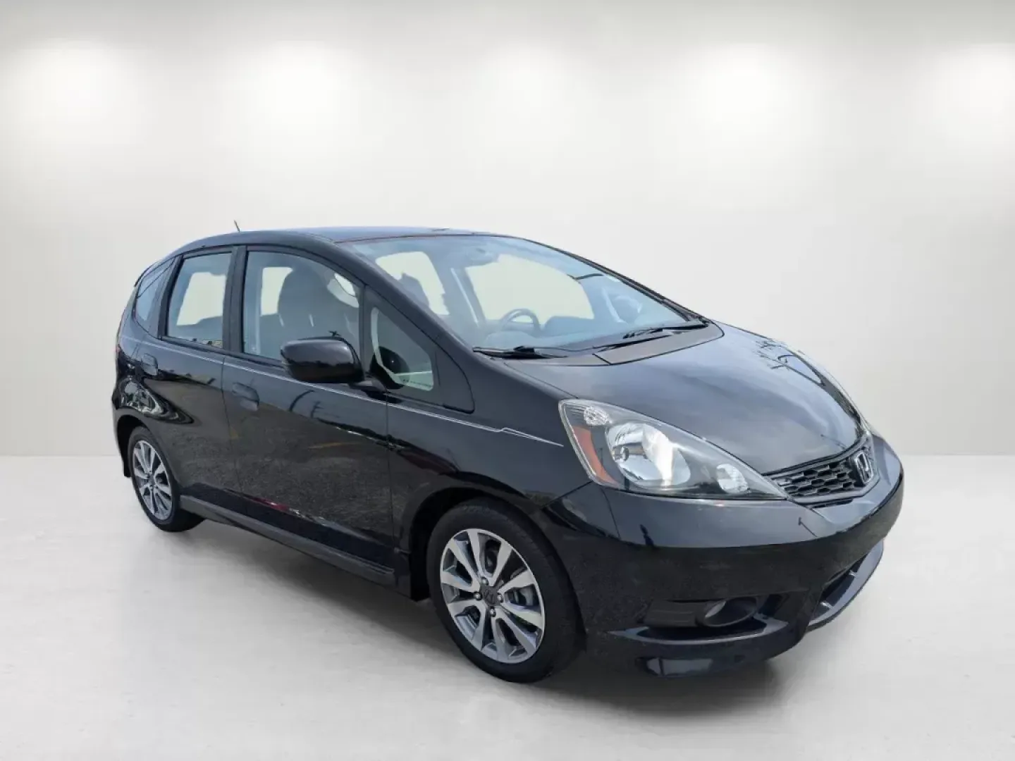 2012 Honda Fit Sport (JHMGE8H57CC) with an Other engine, located at 1430 Gateway Drive, Opelika, AL, 36801, (334) 239-0944, 32.637871, -85.409790 - Are you ready to elevate your daily commute or weekend adventures? The 2012 Honda Fit Sport, available at Gils Auto - Columbus #2, is the perfect blend of efficiency, style, and versatility, making it an ideal choice for budget-conscious buyers and families alike. This compact hatchback is designed - Photo#2