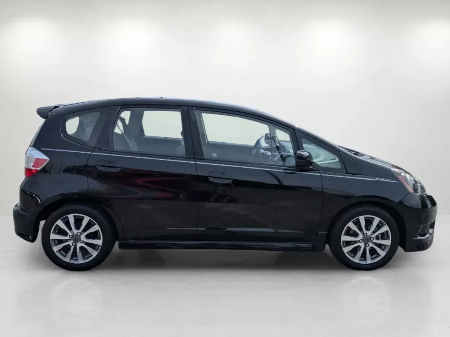 2012 Honda Fit Sport (JHMGE8H57CC) with an Other engine, located at 1430 Gateway Drive, Opelika, AL, 36801, (334) 239-0944, 32.637871, -85.409790 - Are you ready to elevate your daily commute or weekend adventures? The 2012 Honda Fit Sport, available at Gils Auto - Columbus #2, is the perfect blend of efficiency, style, and versatility, making it an ideal choice for budget-conscious buyers and families alike. This compact hatchback is designed - Photo#3