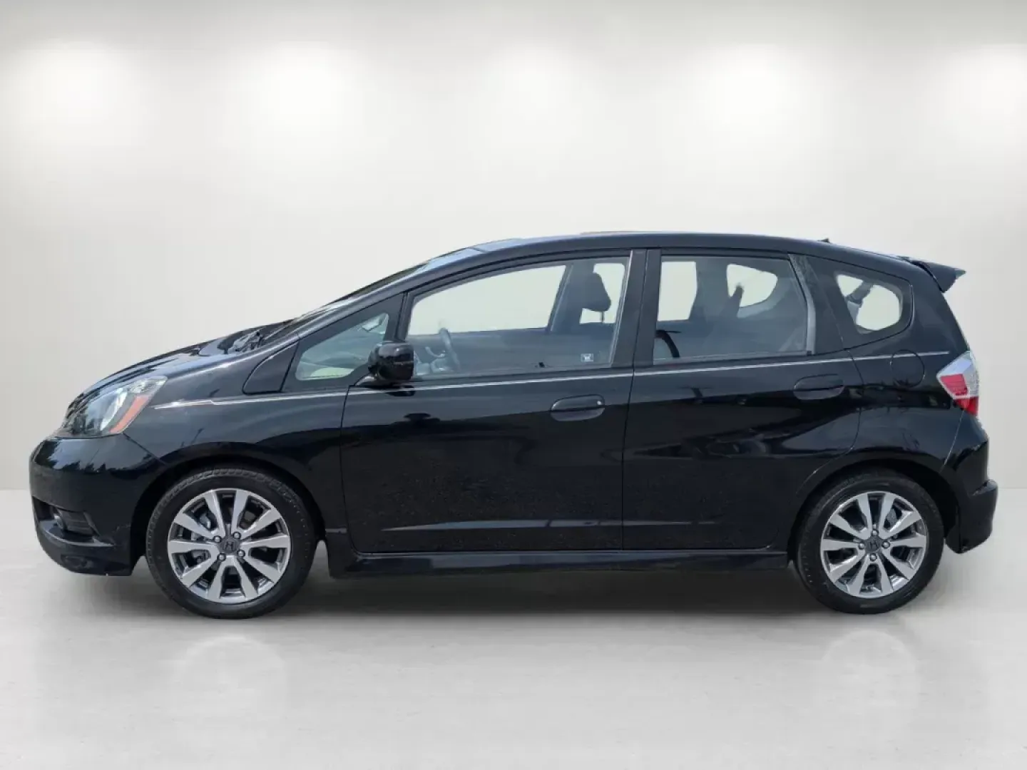 2012 Honda Fit Sport (JHMGE8H57CC) with an Other engine, located at 1430 Gateway Drive, Opelika, AL, 36801, (334) 239-0944, 32.637871, -85.409790 - Are you ready to elevate your daily commute or weekend adventures? The 2012 Honda Fit Sport, available at Gils Auto - Columbus #2, is the perfect blend of efficiency, style, and versatility, making it an ideal choice for budget-conscious buyers and families alike. This compact hatchback is designed - Photo#7