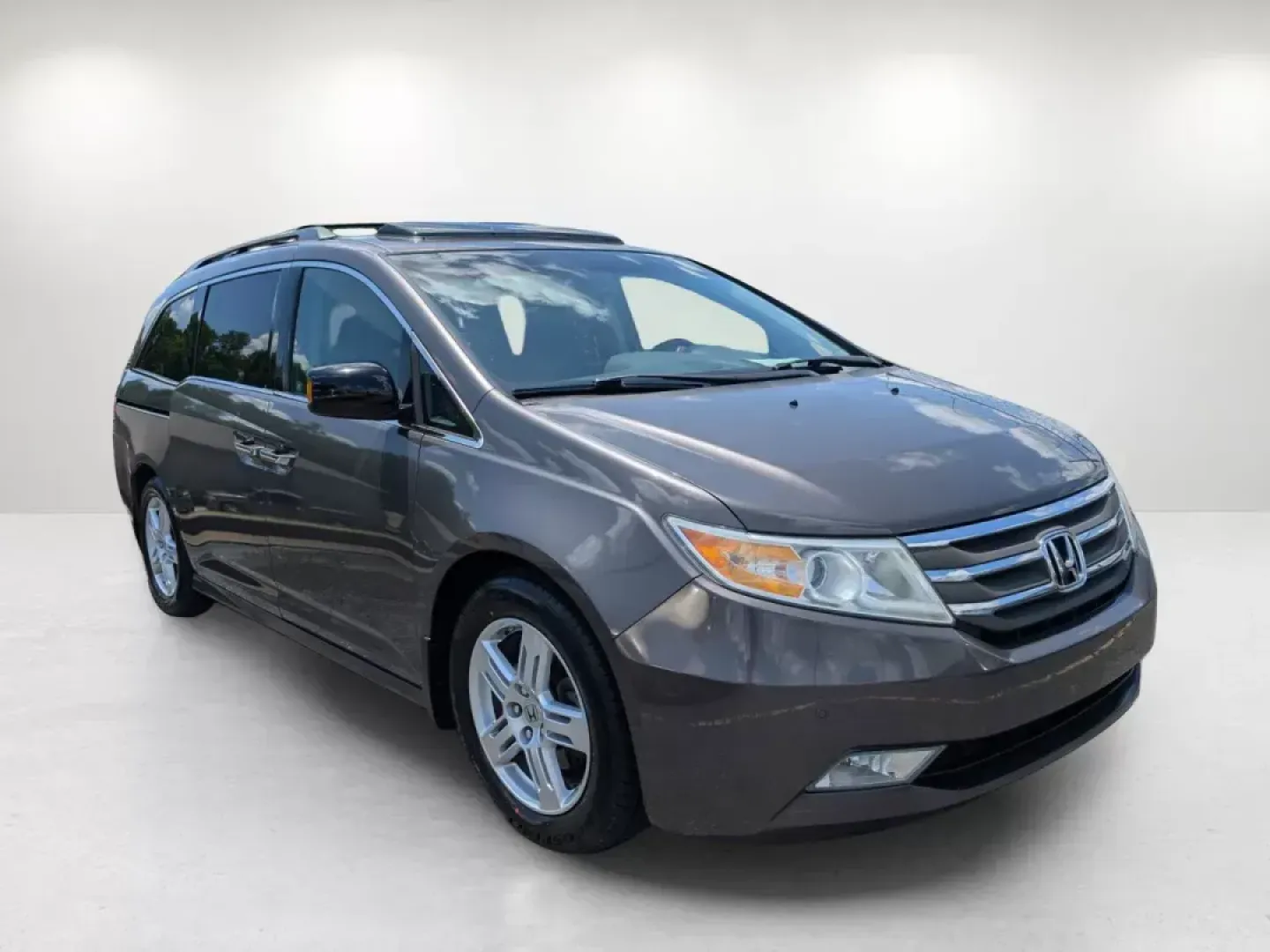 2012 Honda Odyssey Touring (5FNRL5H92CB) with an Gas V6 3.5L/212 engine, 6-Speed Automatic transmission, located at 7000 Northlake Connector, Columbus, GA, 31904, (706) 987-8085, 32.524975, -84.978134 - **Explore the Perfect Family Adventure with the 2012 Honda Odyssey Touring at Gils Auto - Columbus #2!**<br /> <br /> Are you ready to elevate your family's travel experience? The 2012 Honda Odyssey Touring is the ideal minivan that combines comfort, safety, and technology for those unforgettable fa - Photo#2