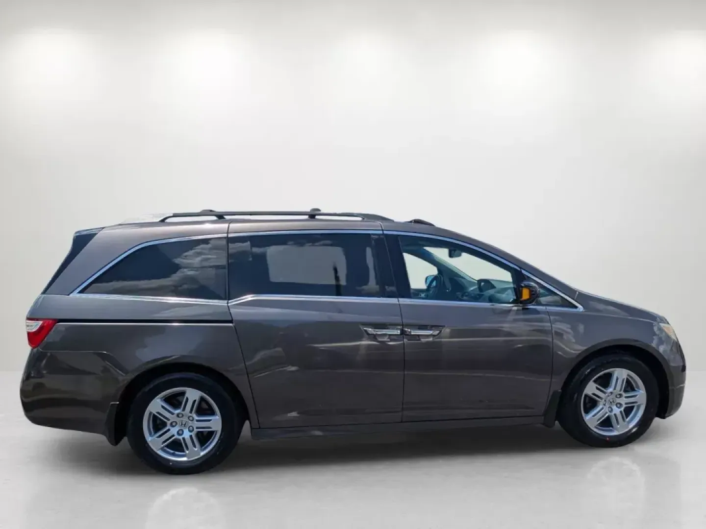 2012 Honda Odyssey Touring (5FNRL5H92CB) with an Gas V6 3.5L/212 engine, 6-Speed Automatic transmission, located at 7000 Northlake Connector, Columbus, GA, 31904, (706) 987-8085, 32.524975, -84.978134 - **Explore the Perfect Family Adventure with the 2012 Honda Odyssey Touring at Gils Auto - Columbus #2!**<br /> <br /> Are you ready to elevate your family's travel experience? The 2012 Honda Odyssey Touring is the ideal minivan that combines comfort, safety, and technology for those unforgettable fa - Photo#3