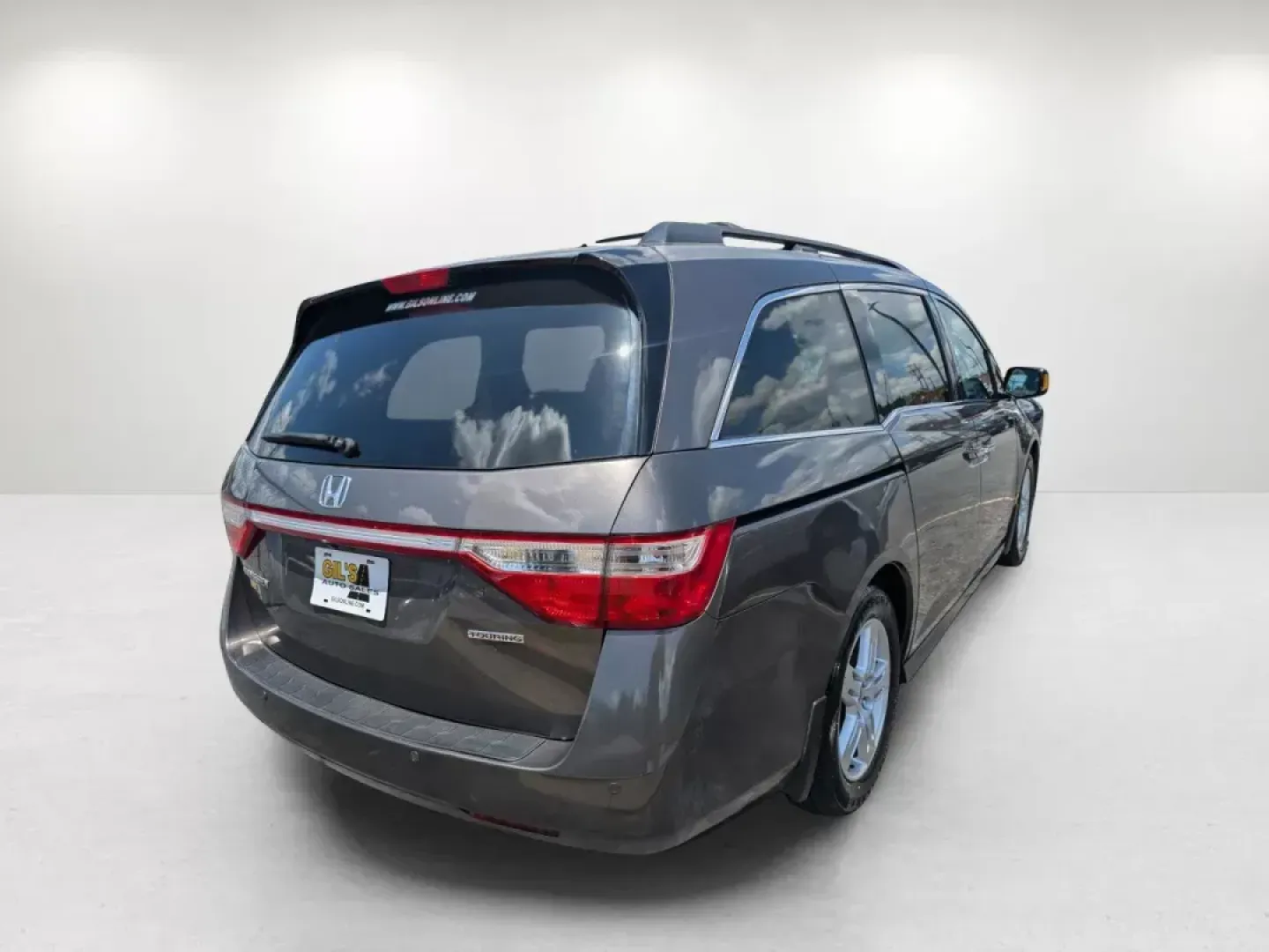 2012 Honda Odyssey Touring (5FNRL5H92CB) with an Gas V6 3.5L/212 engine, 6-Speed Automatic transmission, located at 7000 Northlake Connector, Columbus, GA, 31904, (706) 987-8085, 32.524975, -84.978134 - **Explore the Perfect Family Adventure with the 2012 Honda Odyssey Touring at Gils Auto - Columbus #2!**<br /> <br /> Are you ready to elevate your family's travel experience? The 2012 Honda Odyssey Touring is the ideal minivan that combines comfort, safety, and technology for those unforgettable fa - Photo#4
