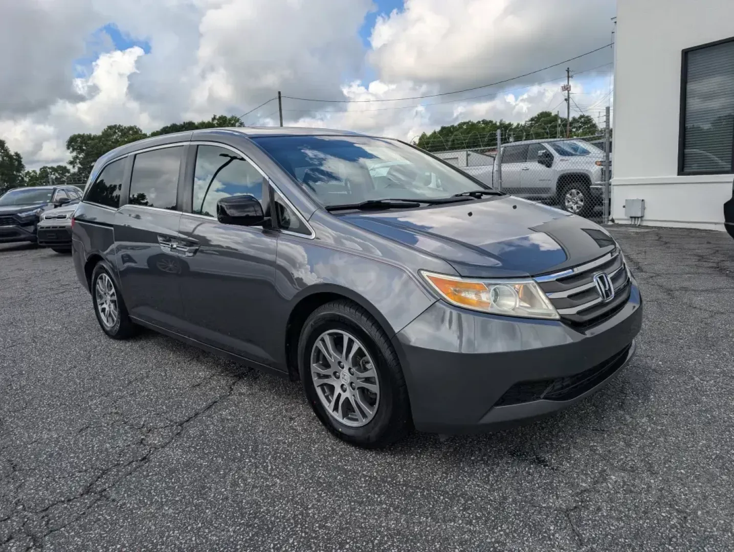 2012 Honda Odyssey EX-L (5FNRL5H68CB) with an Gas V6 3.5L/212 engine, 5-Speed Automatic transmission, located at 1430 Gateway Drive, Opelika, AL, 36801, (334) 239-0944, 32.637871, -85.409790 - 2012 Honda Odyssey EX-L - Photo#2