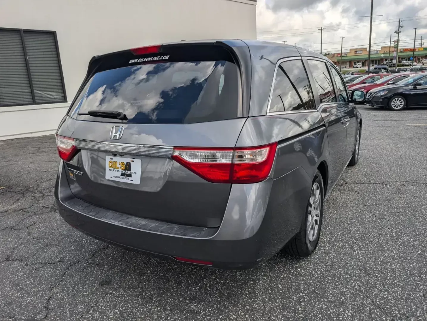 2012 Honda Odyssey EX-L (5FNRL5H68CB) with an Gas V6 3.5L/212 engine, 5-Speed Automatic transmission, located at 1430 Gateway Drive, Opelika, AL, 36801, (334) 239-0944, 32.637871, -85.409790 - 2012 Honda Odyssey EX-L - Photo#4