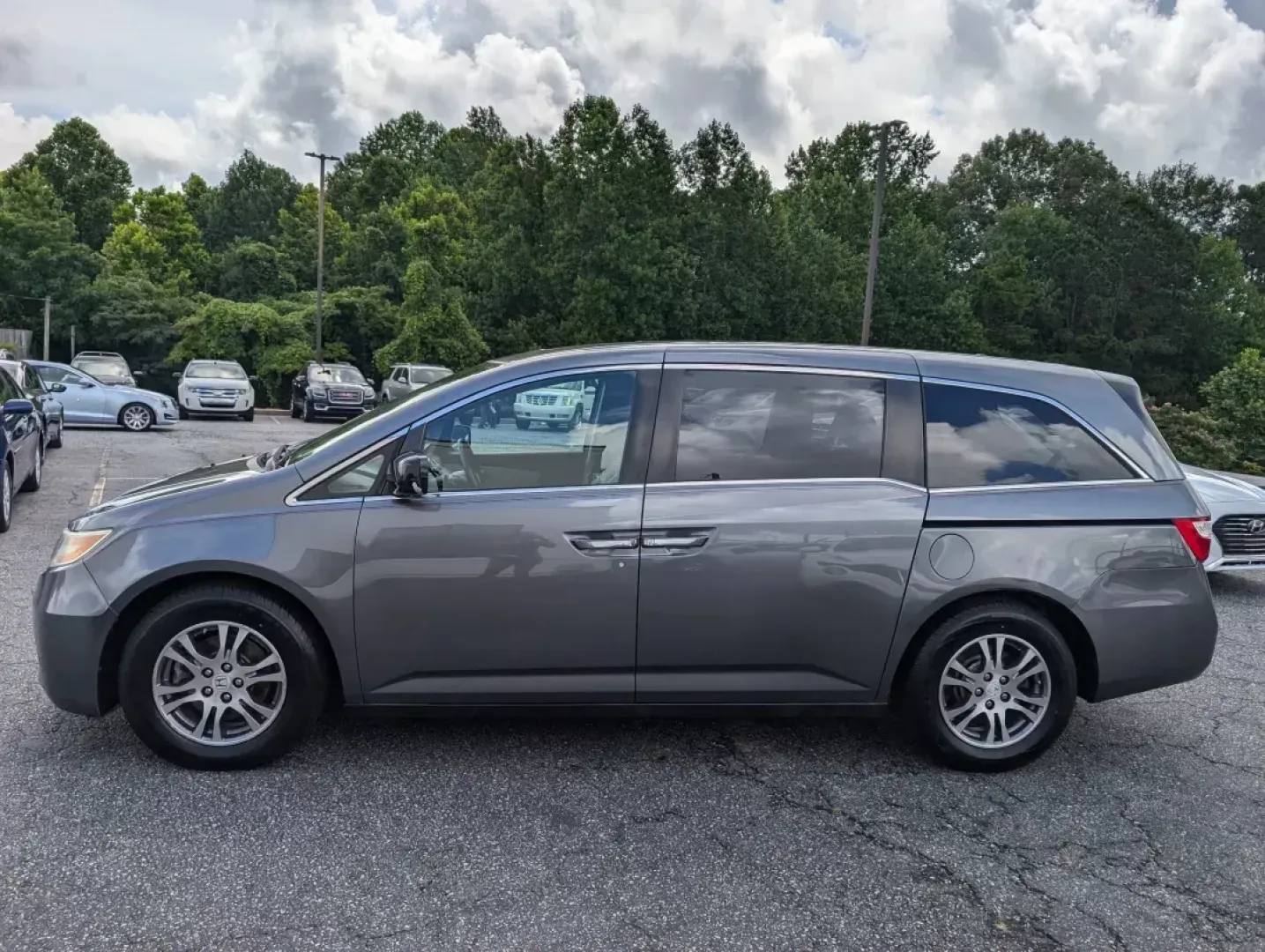 2012 Honda Odyssey EX-L (5FNRL5H68CB) with an Gas V6 3.5L/212 engine, 5-Speed Automatic transmission, located at 1430 Gateway Drive, Opelika, AL, 36801, (334) 239-0944, 32.637871, -85.409790 - 2012 Honda Odyssey EX-L - Photo#7