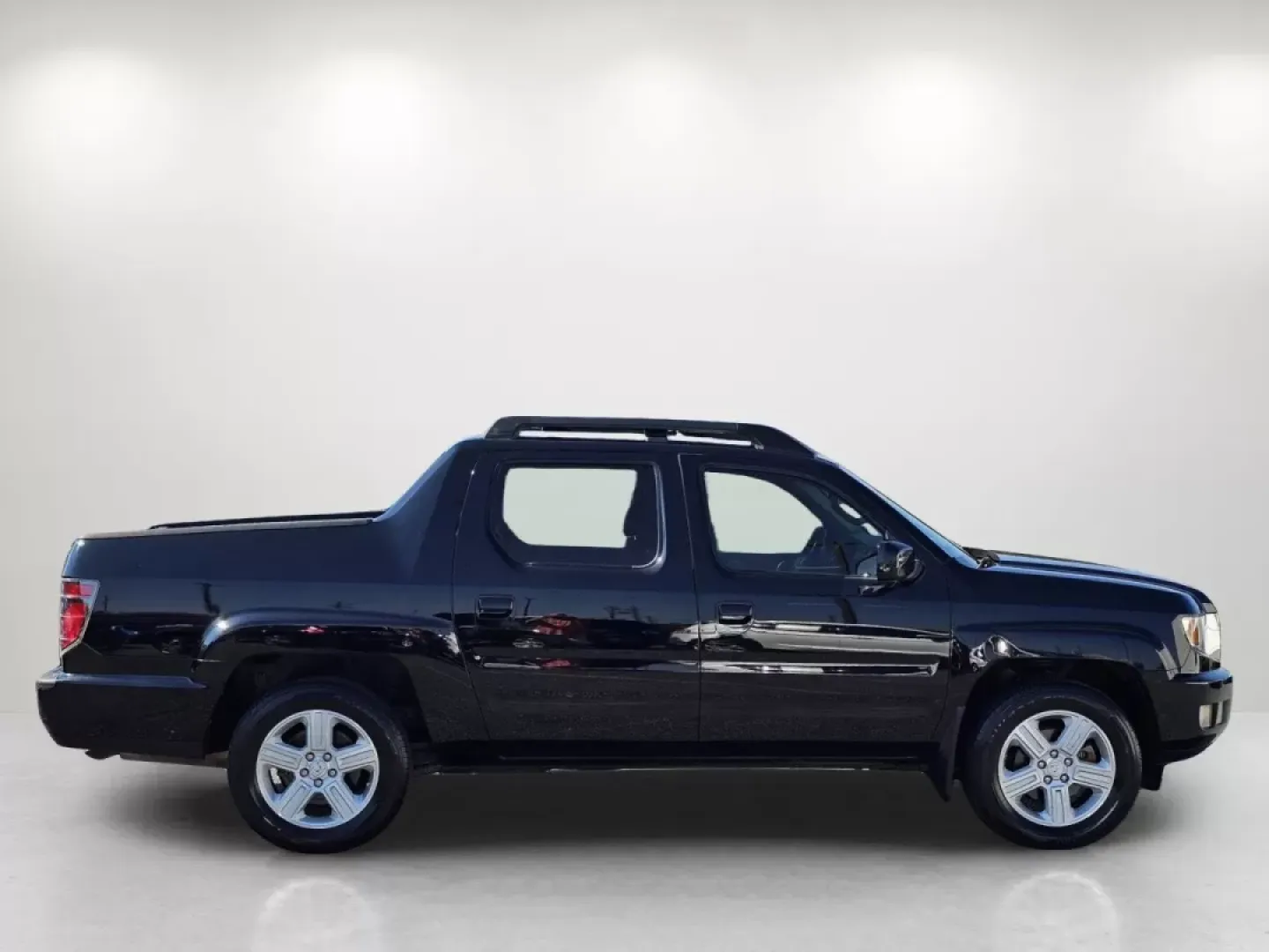 2012 Honda Ridgeline RTL (5FPYK1F56CB) with an Other engine, located at 5115 14th Ave., Columbus, GA, 31904, (706) 323-0345, 32.511494, -84.971046 - **Unleash Your Adventure with the 2012 Honda Ridgeline RTL Perfect for Every Journey!**<br /> <br /> Are you ready to take your weekend adventures to the next level or seamlessly manage your daily commute? Look no further than Gils Auto in Phenix City, AL! Our 2012 Honda Ridgeline RTL is the ultima - Photo#2