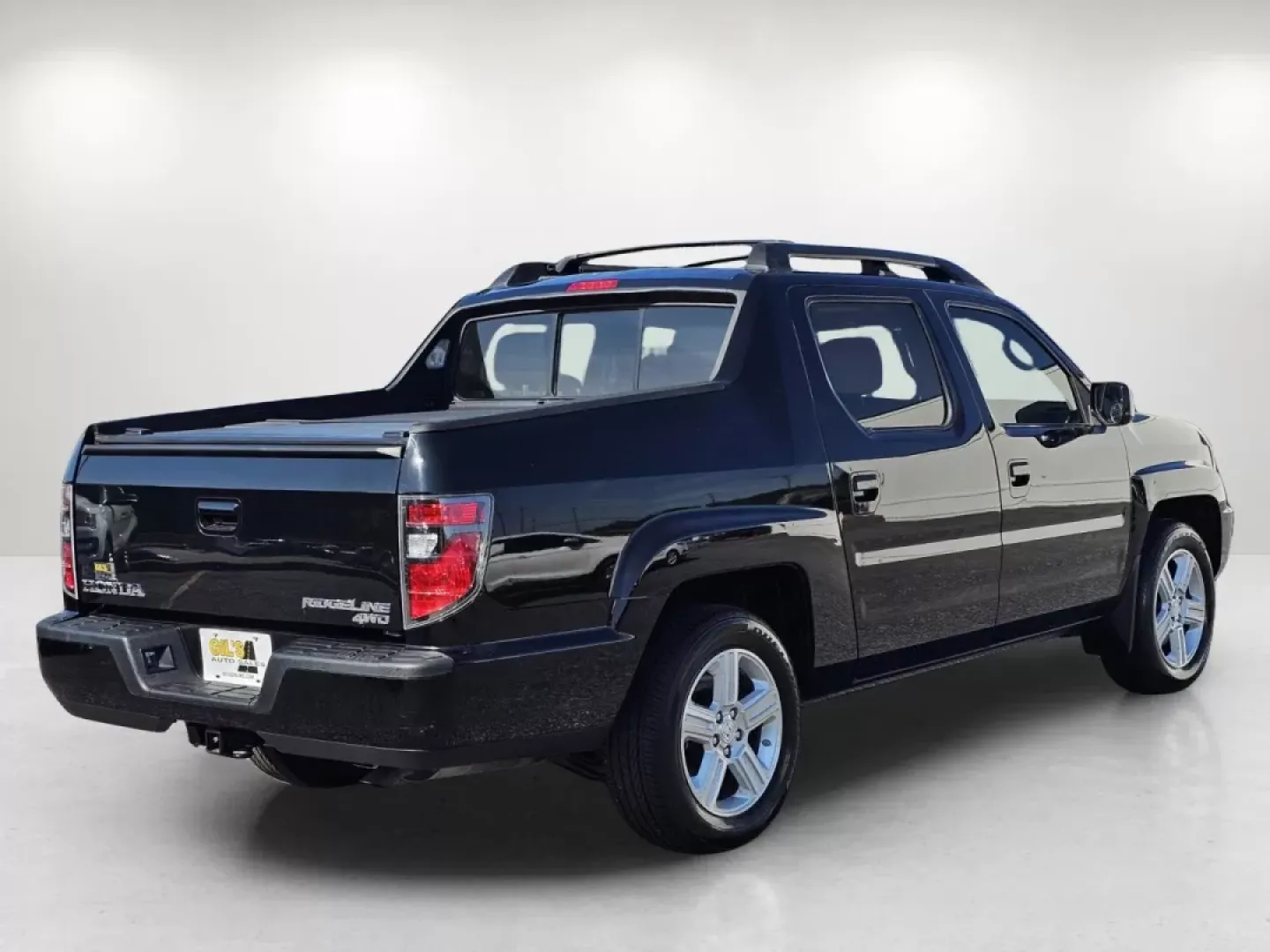 2012 Honda Ridgeline RTL (5FPYK1F56CB) with an Other engine, located at 5115 14th Ave., Columbus, GA, 31904, (706) 323-0345, 32.511494, -84.971046 - **Unleash Your Adventure with the 2012 Honda Ridgeline RTL Perfect for Every Journey!**<br /> <br /> Are you ready to take your weekend adventures to the next level or seamlessly manage your daily commute? Look no further than Gils Auto in Phenix City, AL! Our 2012 Honda Ridgeline RTL is the ultima - Photo#3