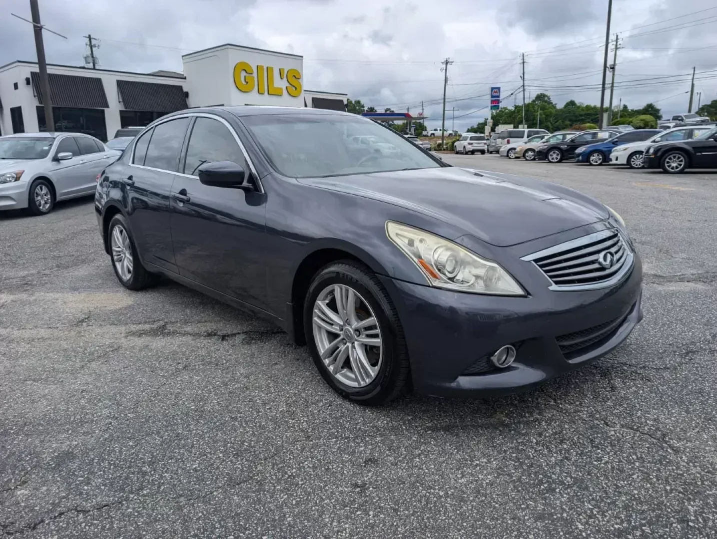 2012 /Stone Infiniti G25 Sedan x (JN1DV6AR8CM) with an Other engine, located at 5115 14th Ave., Columbus, GA, 31904, (706) 323-0345, 32.511494, -84.971046 - If you're looking for a stylish, dependable vehicle that fits seamlessly into an active lifestyle, look no further than this 2012 Infiniti G25 Sedan, now available at Gils Auto - Columbus. With its elegant design and robust performance, this sedan is perfect for everything from daily commutes to wee - Photo#2