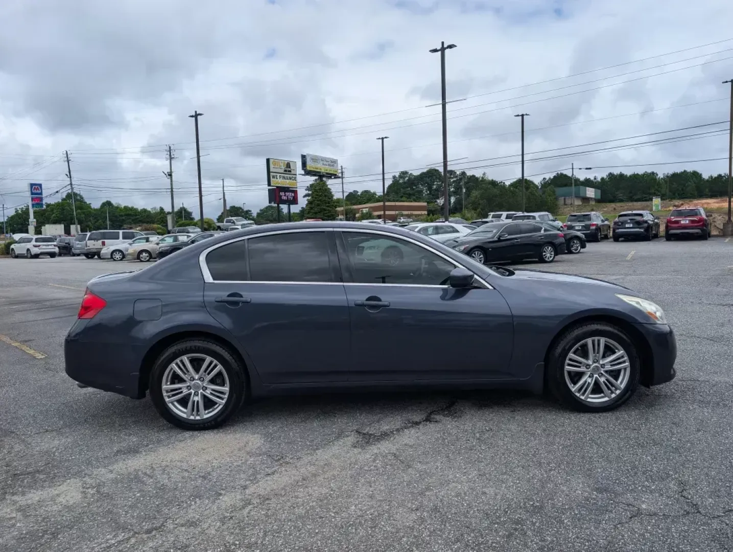 2012 /Stone Infiniti G25 Sedan x (JN1DV6AR8CM) with an Other engine, located at 5115 14th Ave., Columbus, GA, 31904, (706) 323-0345, 32.511494, -84.971046 - If you're looking for a stylish, dependable vehicle that fits seamlessly into an active lifestyle, look no further than this 2012 Infiniti G25 Sedan, now available at Gils Auto - Columbus. With its elegant design and robust performance, this sedan is perfect for everything from daily commutes to wee - Photo#3