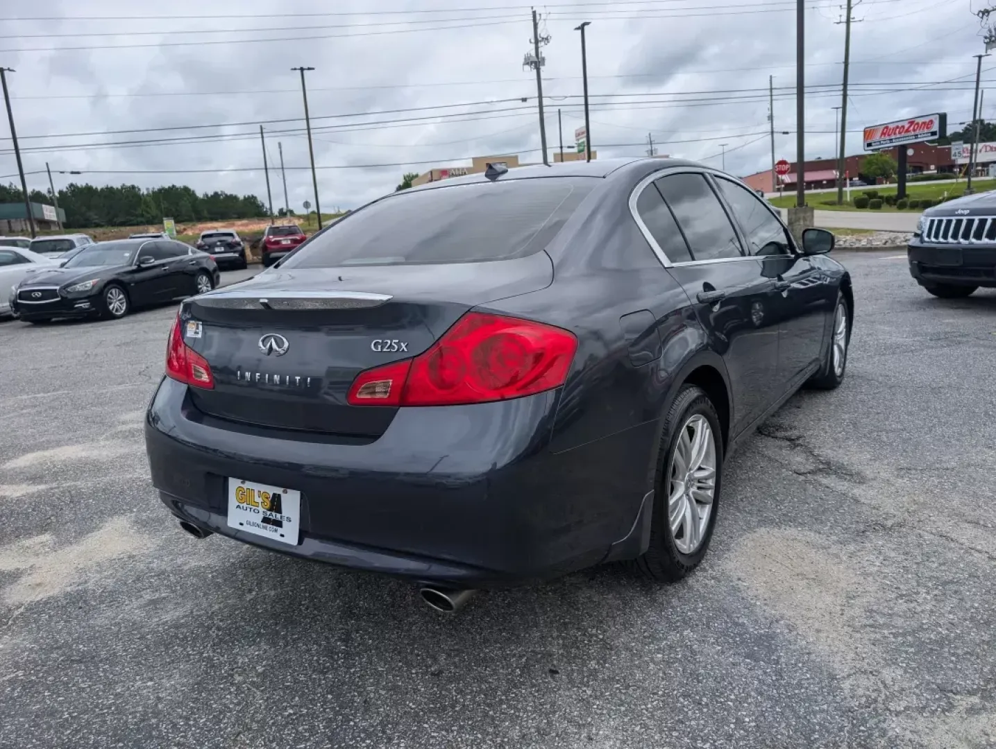 2012 /Stone Infiniti G25 Sedan x (JN1DV6AR8CM) with an Other engine, located at 5115 14th Ave., Columbus, GA, 31904, (706) 323-0345, 32.511494, -84.971046 - If you're looking for a stylish, dependable vehicle that fits seamlessly into an active lifestyle, look no further than this 2012 Infiniti G25 Sedan, now available at Gils Auto - Columbus. With its elegant design and robust performance, this sedan is perfect for everything from daily commutes to wee - Photo#4