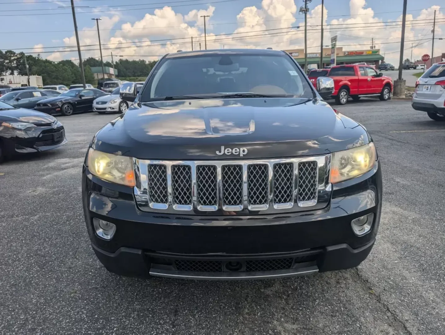 2012 /Black/New Saddle Jeep Grand Cherokee Overland Summit (1C4RJECT6CC) with an Other engine, located at 3959 U.S. 80 W, Phenix City, AL, 36870, (334) 297-4885, 32.469296, -85.135185 - **Conquer the Road with the 2012 Jeep Grand Cherokee Overland Summit! Ideal for Your Next Adventure!**<br /> <br /> Are you ready to elevate your driving experience? The 2012 Jeep Grand Cherokee Overland Summit is the perfect companion for those who crave adventure without sacrificing comfort. Wheth - Photo#1