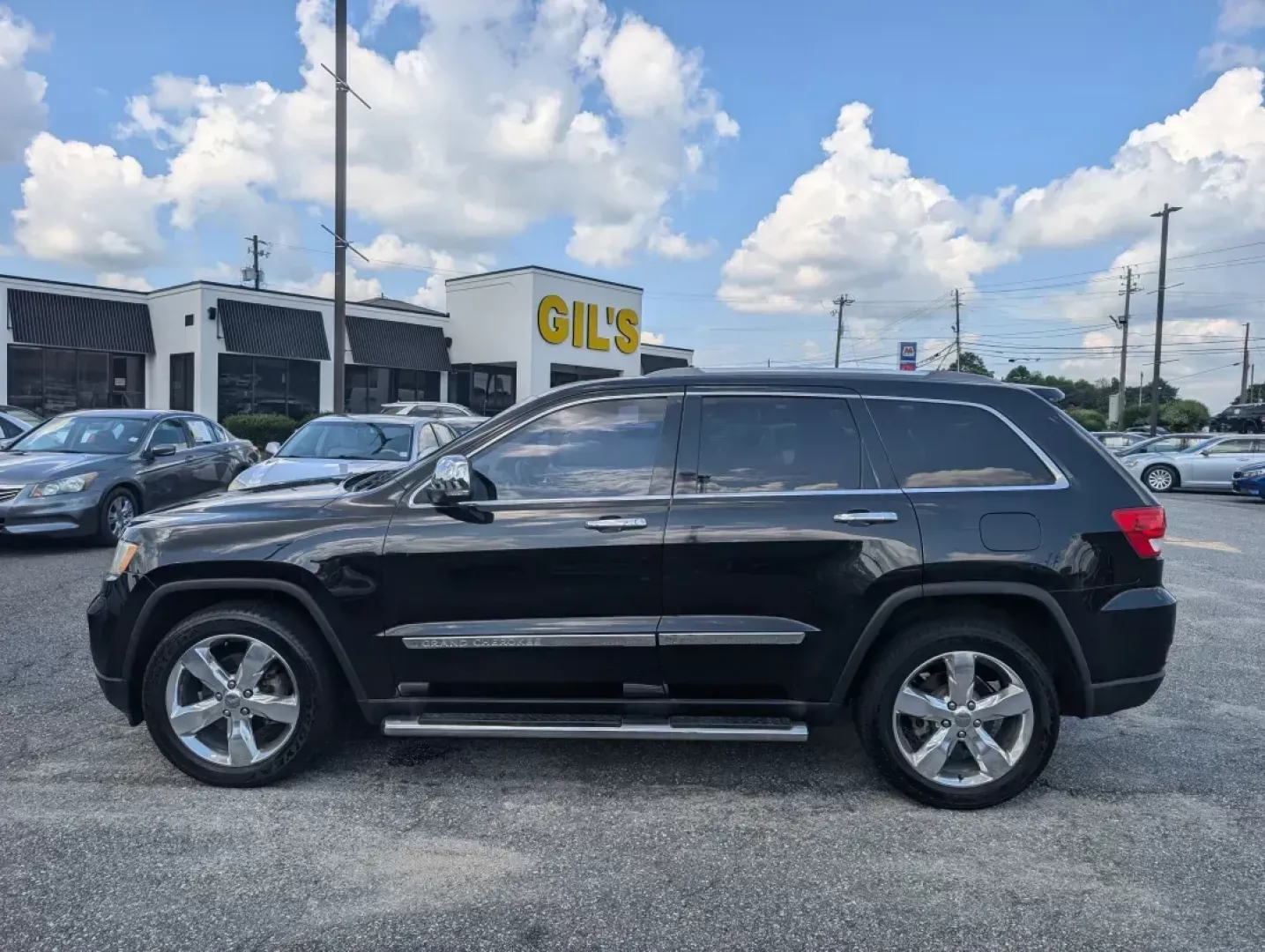 2012 /Black/New Saddle Jeep Grand Cherokee Overland Summit (1C4RJECT6CC) with an Other engine, located at 3959 U.S. 80 W, Phenix City, AL, 36870, (334) 297-4885, 32.469296, -85.135185 - **Conquer the Road with the 2012 Jeep Grand Cherokee Overland Summit! Ideal for Your Next Adventure!**<br /> <br /> Are you ready to elevate your driving experience? The 2012 Jeep Grand Cherokee Overland Summit is the perfect companion for those who crave adventure without sacrificing comfort. Wheth - Photo#7