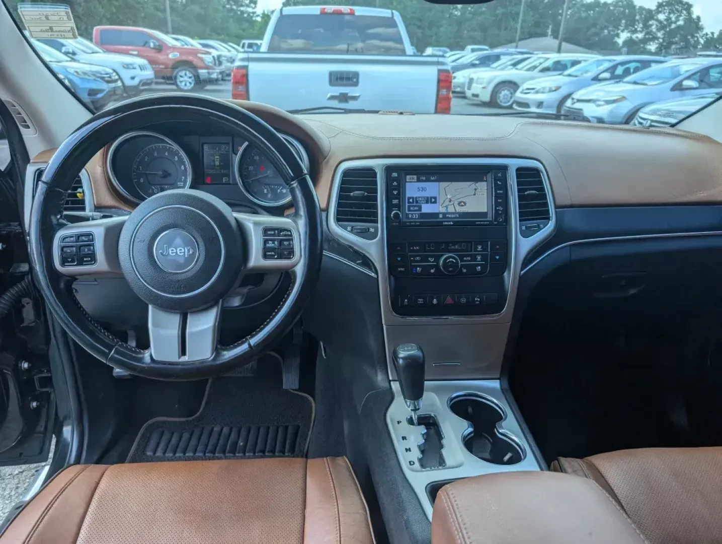 2012 /Black/New Saddle Jeep Grand Cherokee Overland Summit (1C4RJECT6CC) with an Other engine, located at 3959 U.S. 80 W, Phenix City, AL, 36870, (334) 297-4885, 32.469296, -85.135185 - **Conquer the Road with the 2012 Jeep Grand Cherokee Overland Summit! Ideal for Your Next Adventure!**<br /> <br /> Are you ready to elevate your driving experience? The 2012 Jeep Grand Cherokee Overland Summit is the perfect companion for those who crave adventure without sacrificing comfort. Wheth - Photo#11