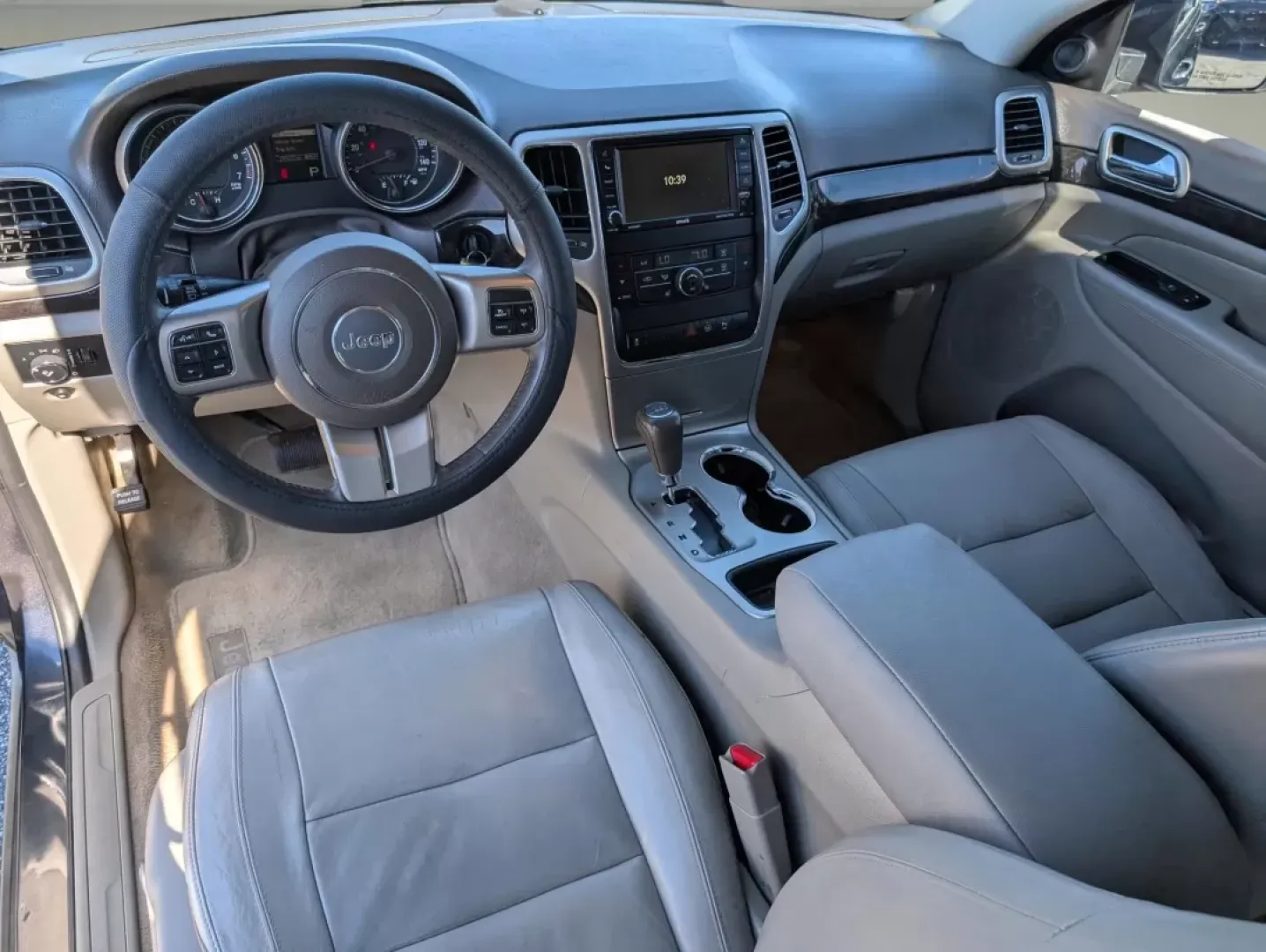 2012 /Dark Graystone/Medium Graystone Jeep Grand Cherokee Laredo Altitude (1C4RJEAG0CC) with an Other engine, located at 1430 Gateway Drive, Opelika, AL, 36801, (334) 239-0944, 32.637871, -85.409790 - **Unleash Your Adventurous Spirit with the 2012 Jeep Grand Cherokee Laredo Altitude!**<br /> <br /> Are you looking for the perfect vehicle to elevate your lifestyle? Whether it's weekend getaways, daily commutes, or family road trips, the 2012 Jeep Grand Cherokee Laredo Altitude is designed to meet - Photo#14