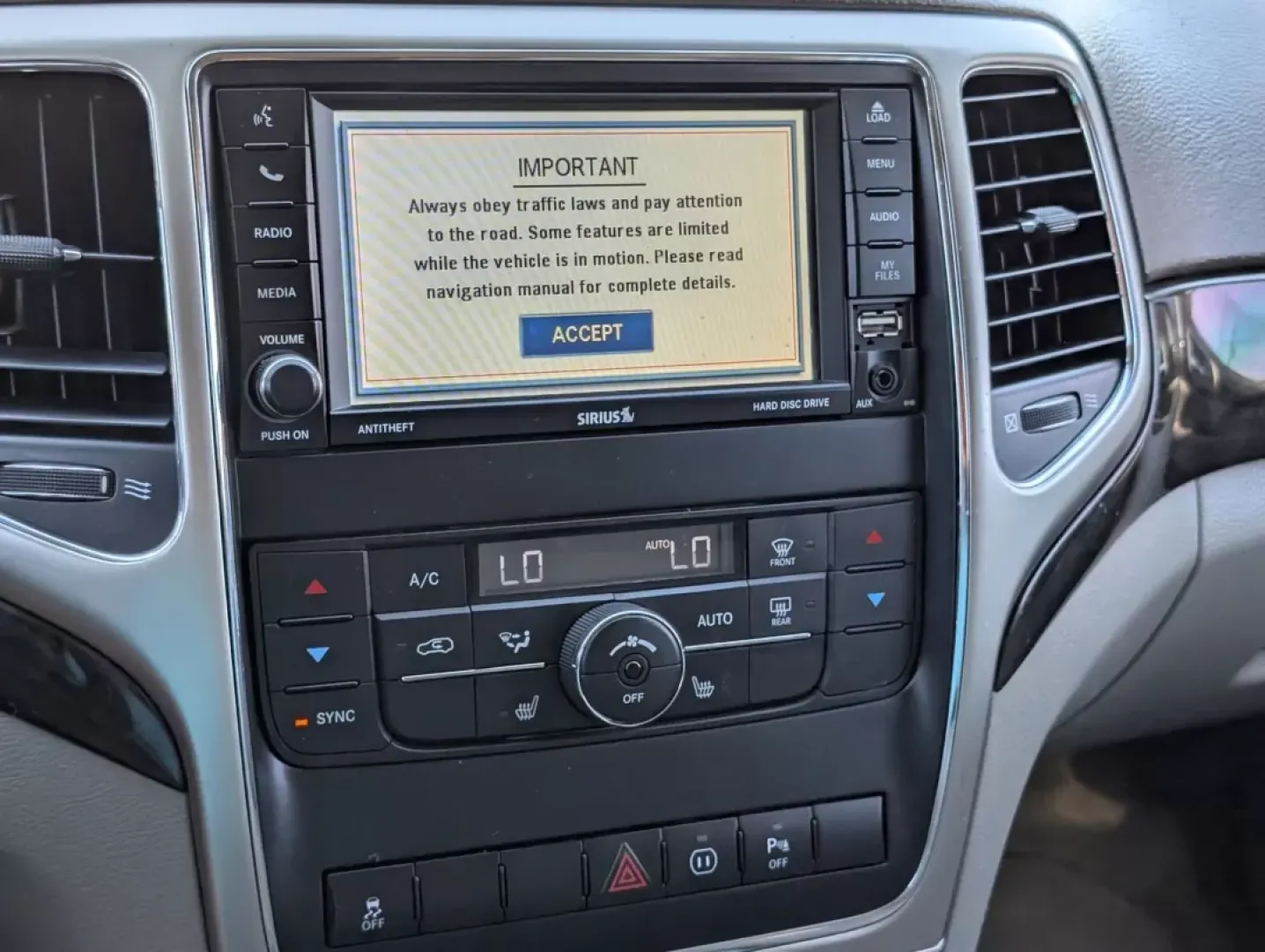 2012 /Dark Graystone/Medium Graystone Jeep Grand Cherokee Laredo Altitude (1C4RJEAG0CC) with an Other engine, located at 1430 Gateway Drive, Opelika, AL, 36801, (334) 239-0944, 32.637871, -85.409790 - **Unleash Your Adventurous Spirit with the 2012 Jeep Grand Cherokee Laredo Altitude!**<br /> <br /> Are you looking for the perfect vehicle to elevate your lifestyle? Whether it's weekend getaways, daily commutes, or family road trips, the 2012 Jeep Grand Cherokee Laredo Altitude is designed to meet - Photo#16