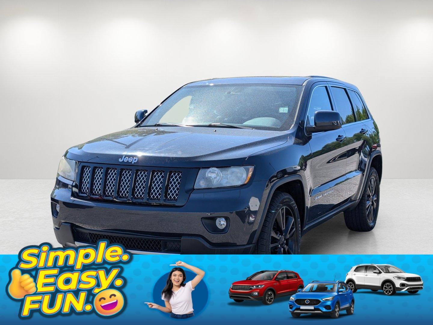 2012 /Black Jeep Grand Cherokee Laredo Altitude (1C4RJFAG0CC) with an Gas/Ethanol V6 3.6L/220 engine, 5-Speed Automatic transmission, located at 521 Old Farm Lane Rd, Prattville, AL, 36066, (334) 325-1505, 32.482460, -86.416367 - 2012 Jeep Grand Cherokee Laredo Altitude - Photo#0